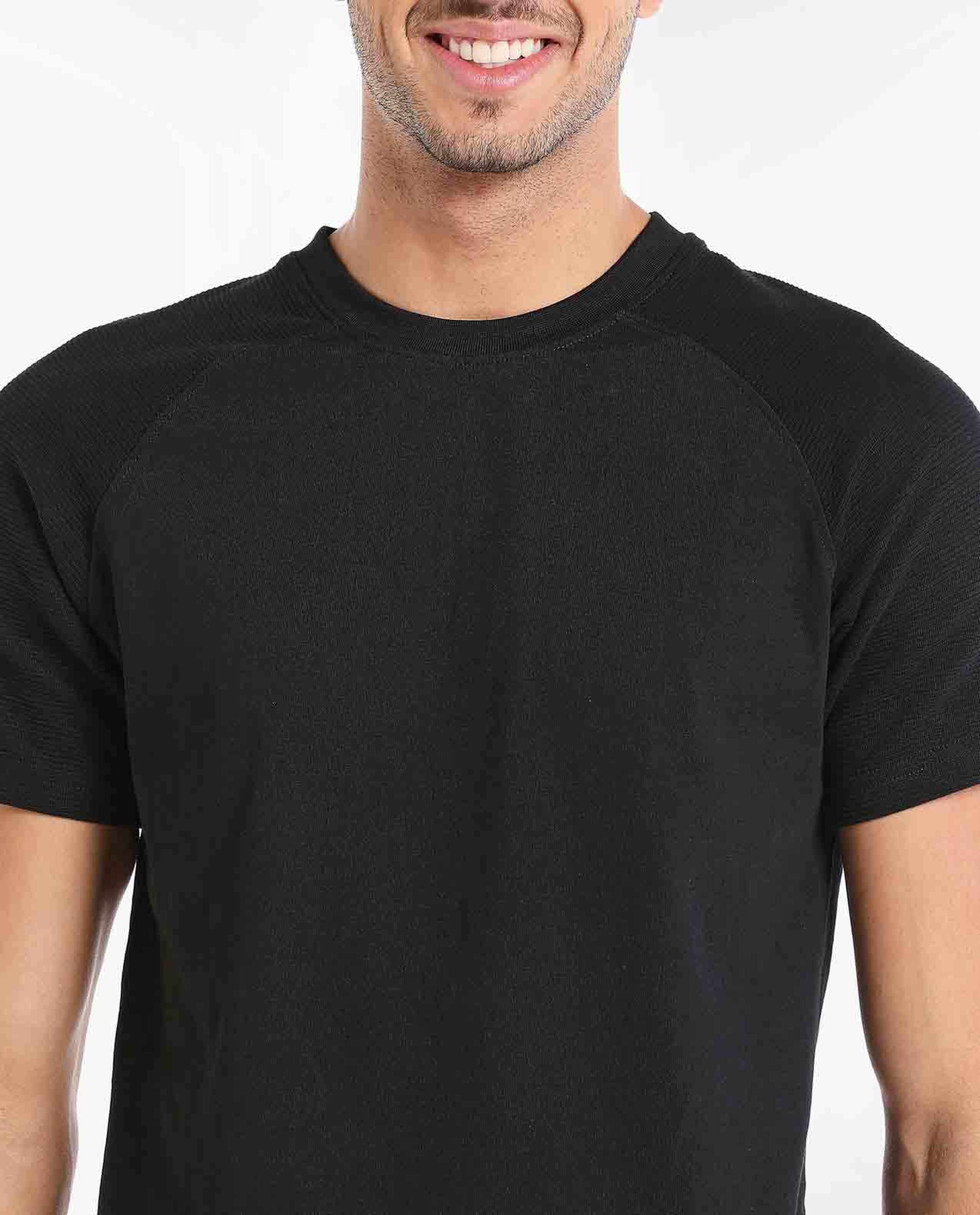Solid T-Shirt With Round Neck And Long Raglan Sleeves