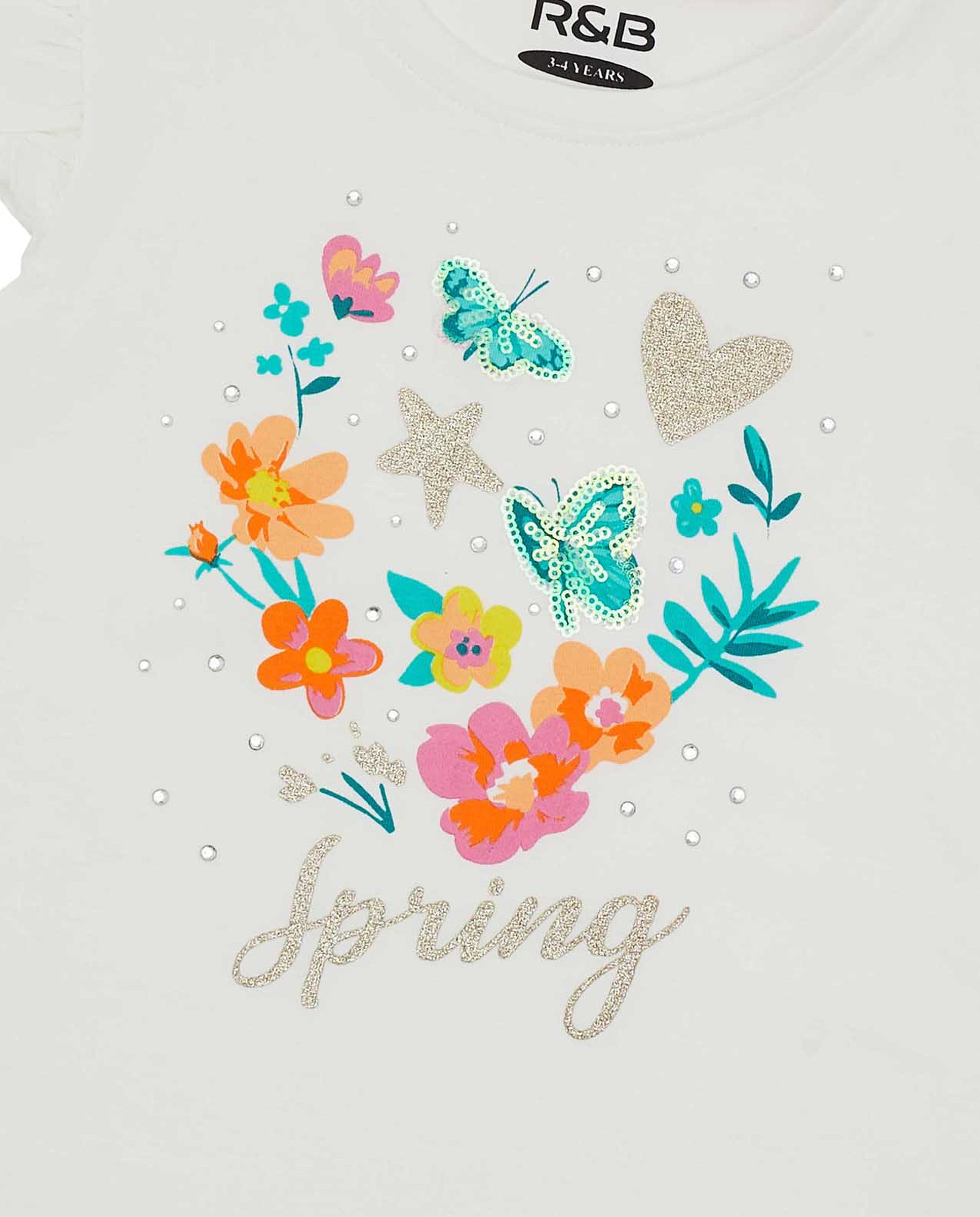 تيشيرت برقبة دائرية وأكمام مكشكشة بطبعة