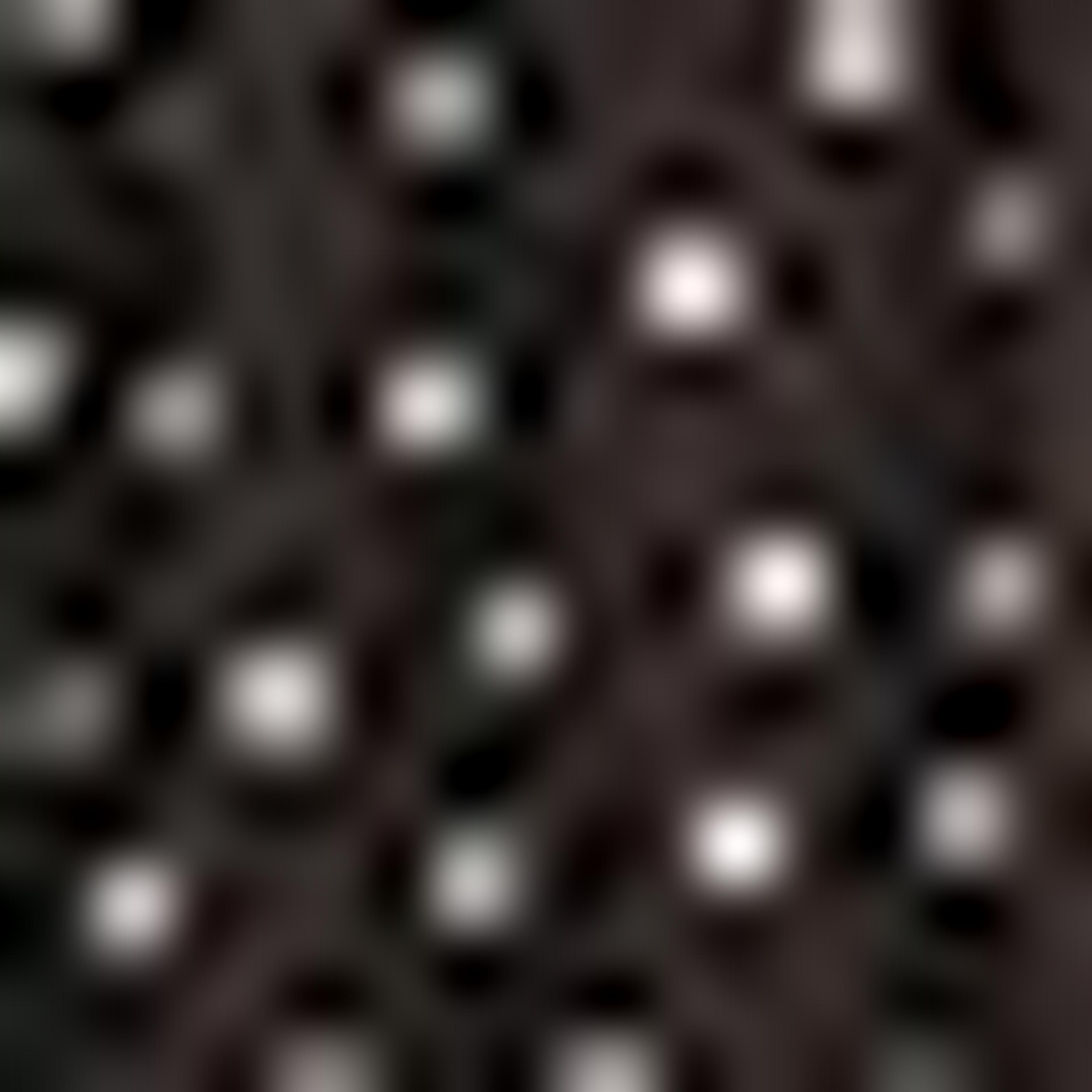 دمية منقطة ومطرزة