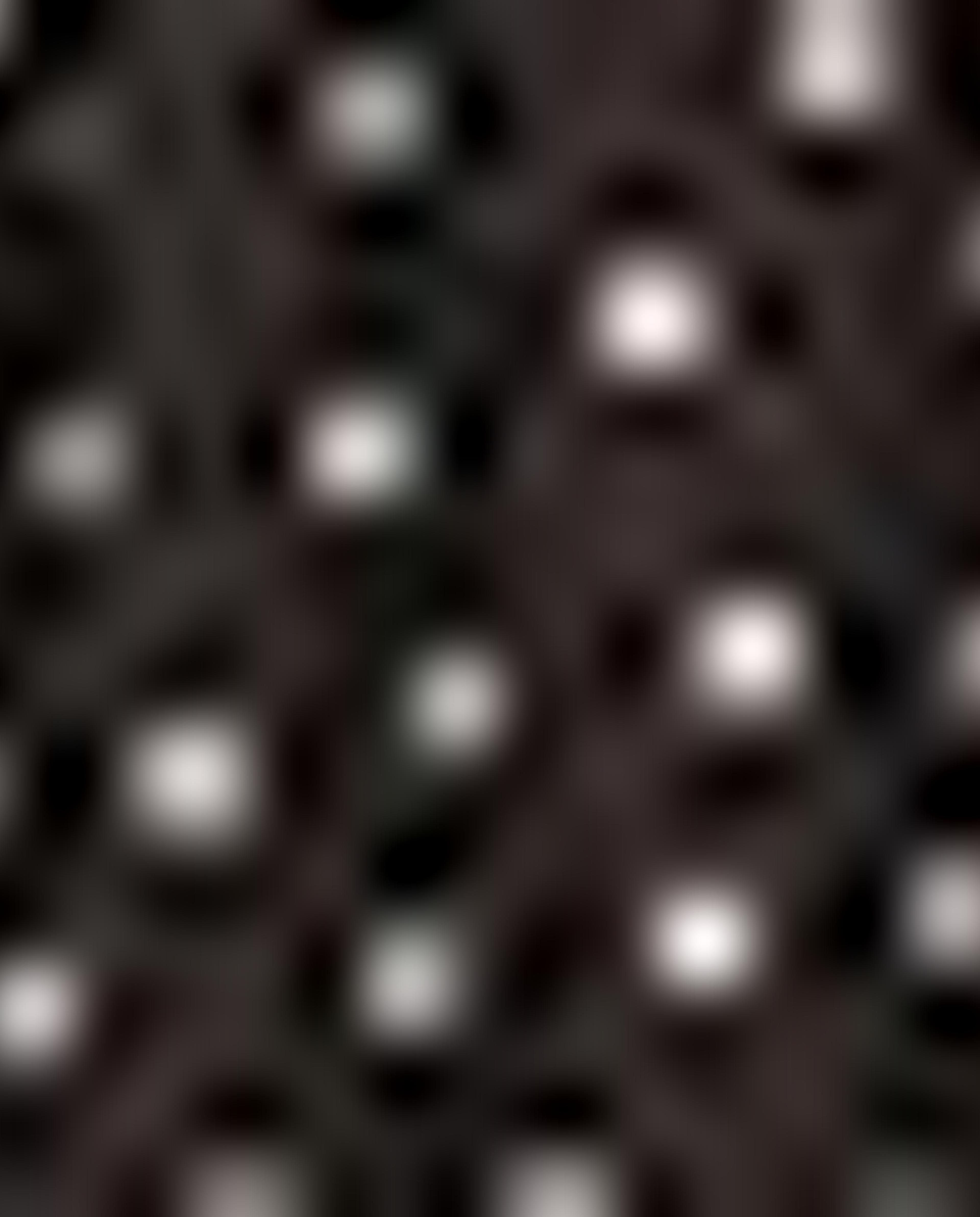 دمية منقطة ومطرزة