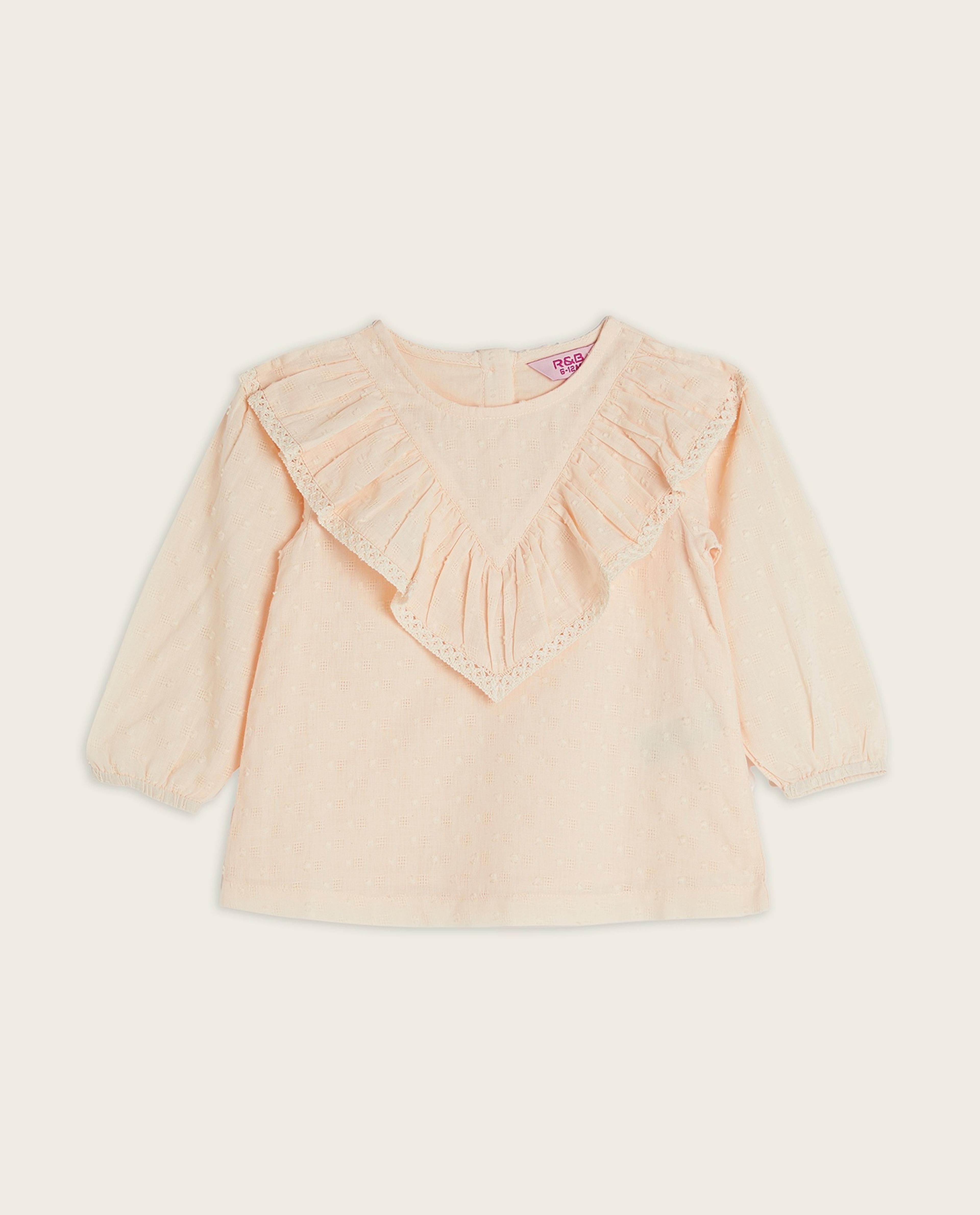 توب بياقة دائرية وأكمام طويلة