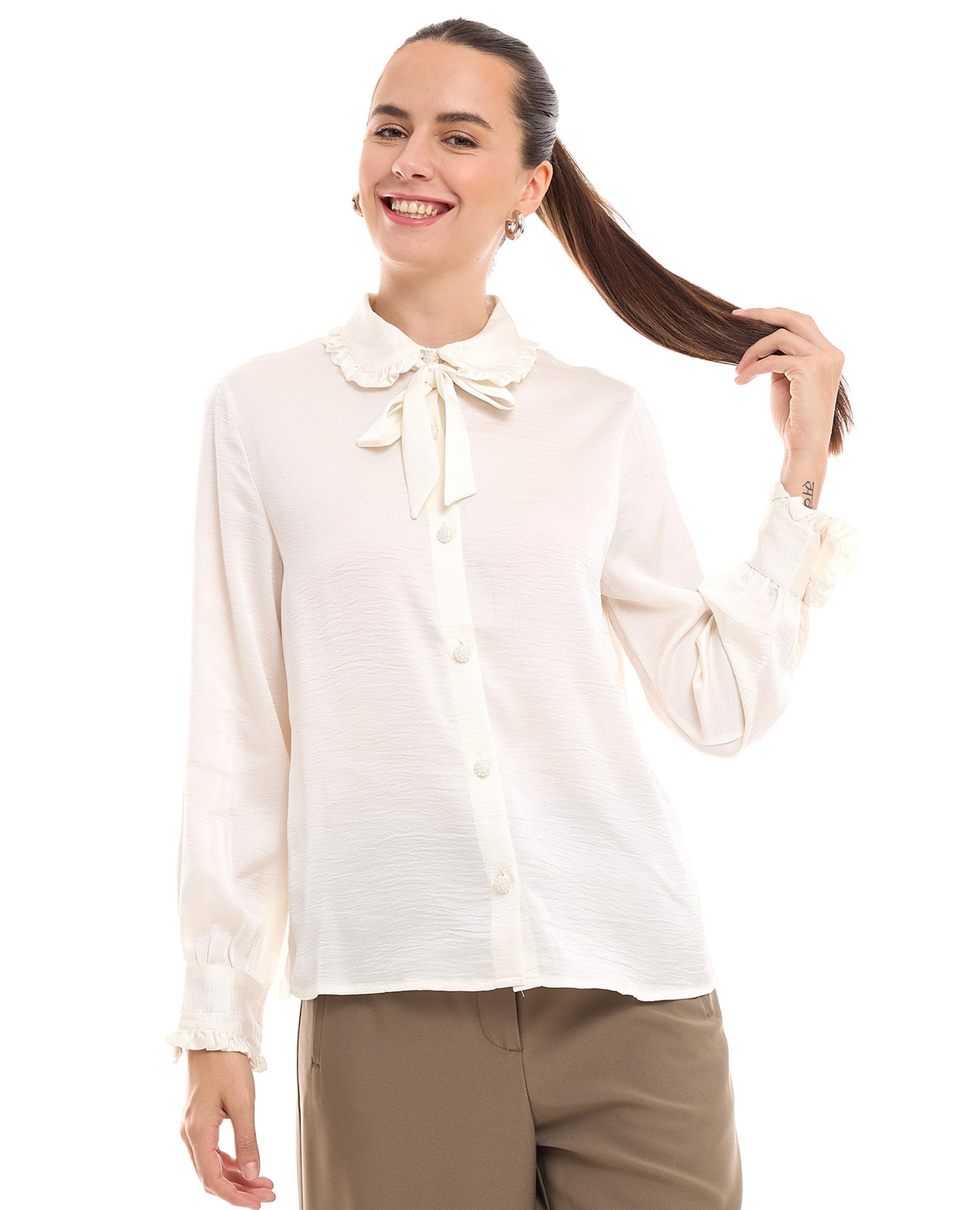 قميص مزين بتفاصيل أزرار