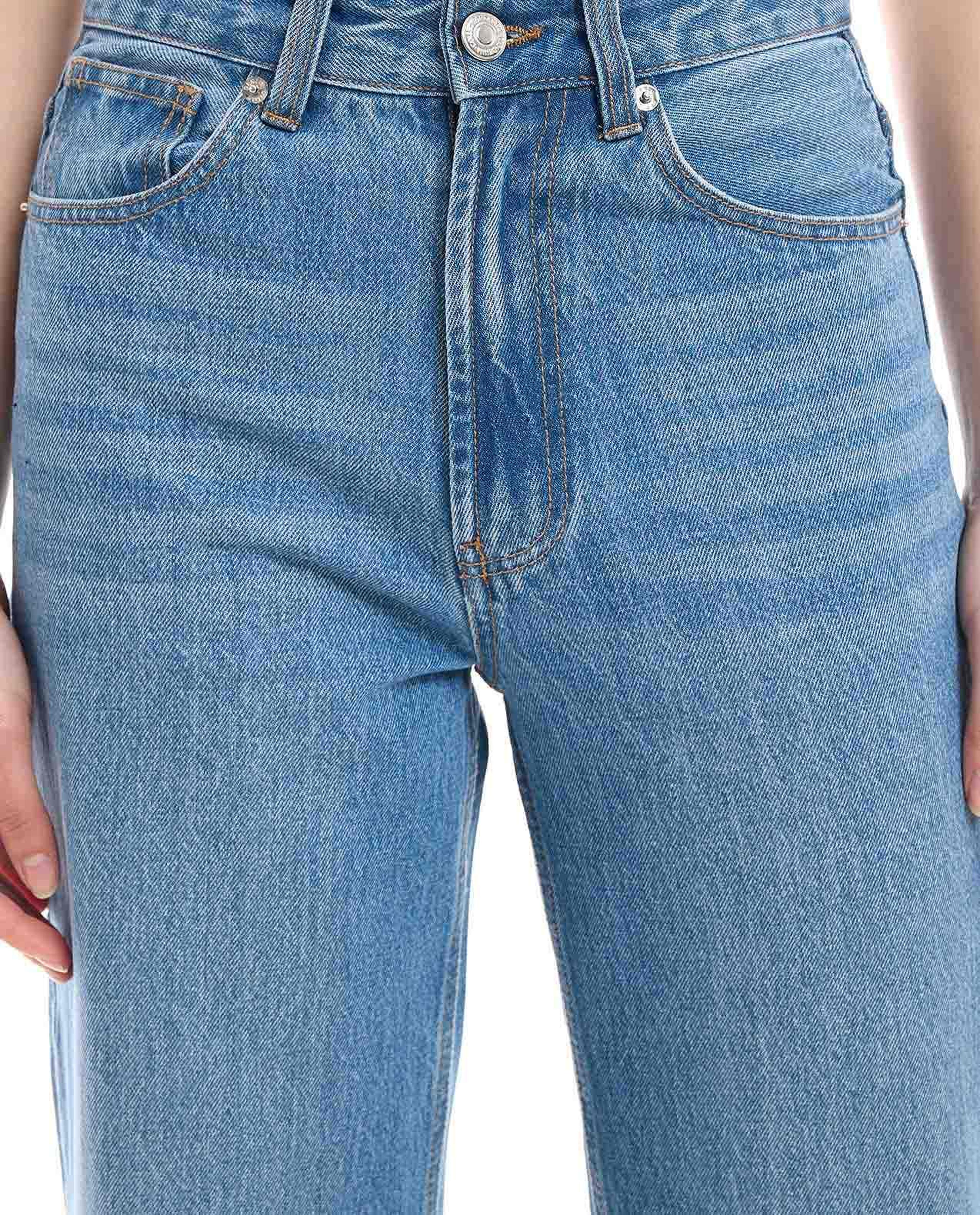 Faded Wide Leg Jeans with Button Closure