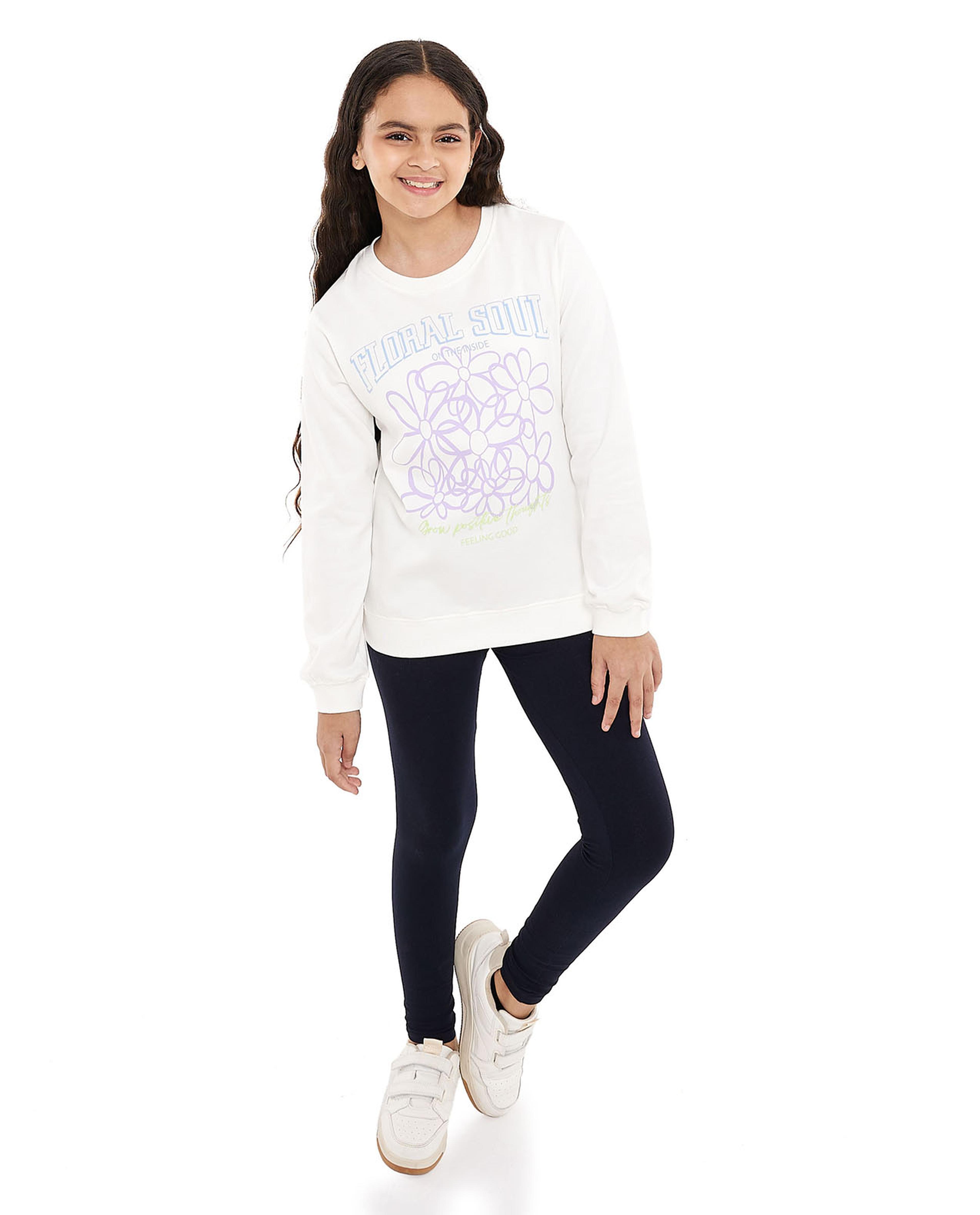 سويتشيرت برقبة مستديرة وأكمام طويلة