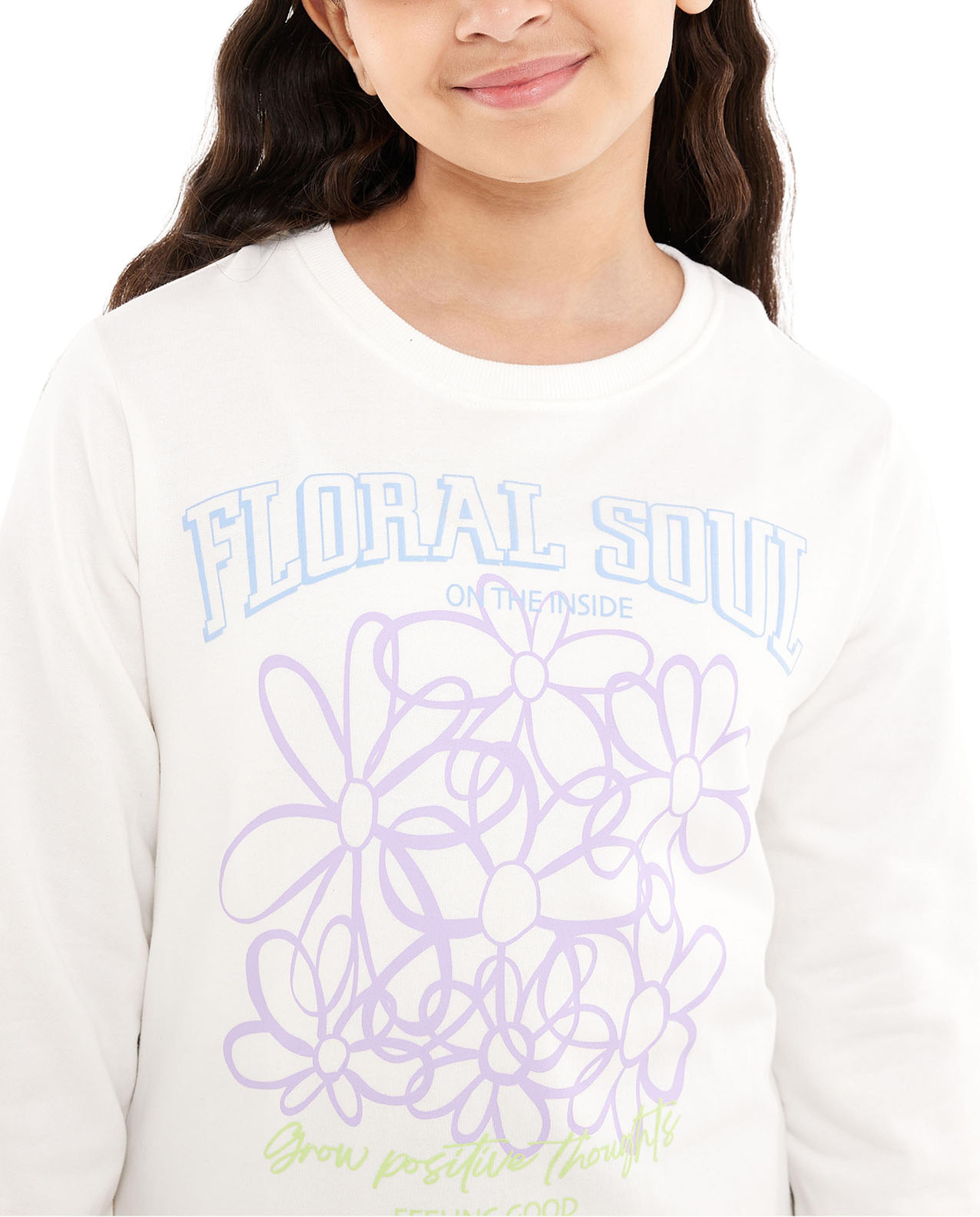 سويتشيرت برقبة مستديرة وأكمام طويلة