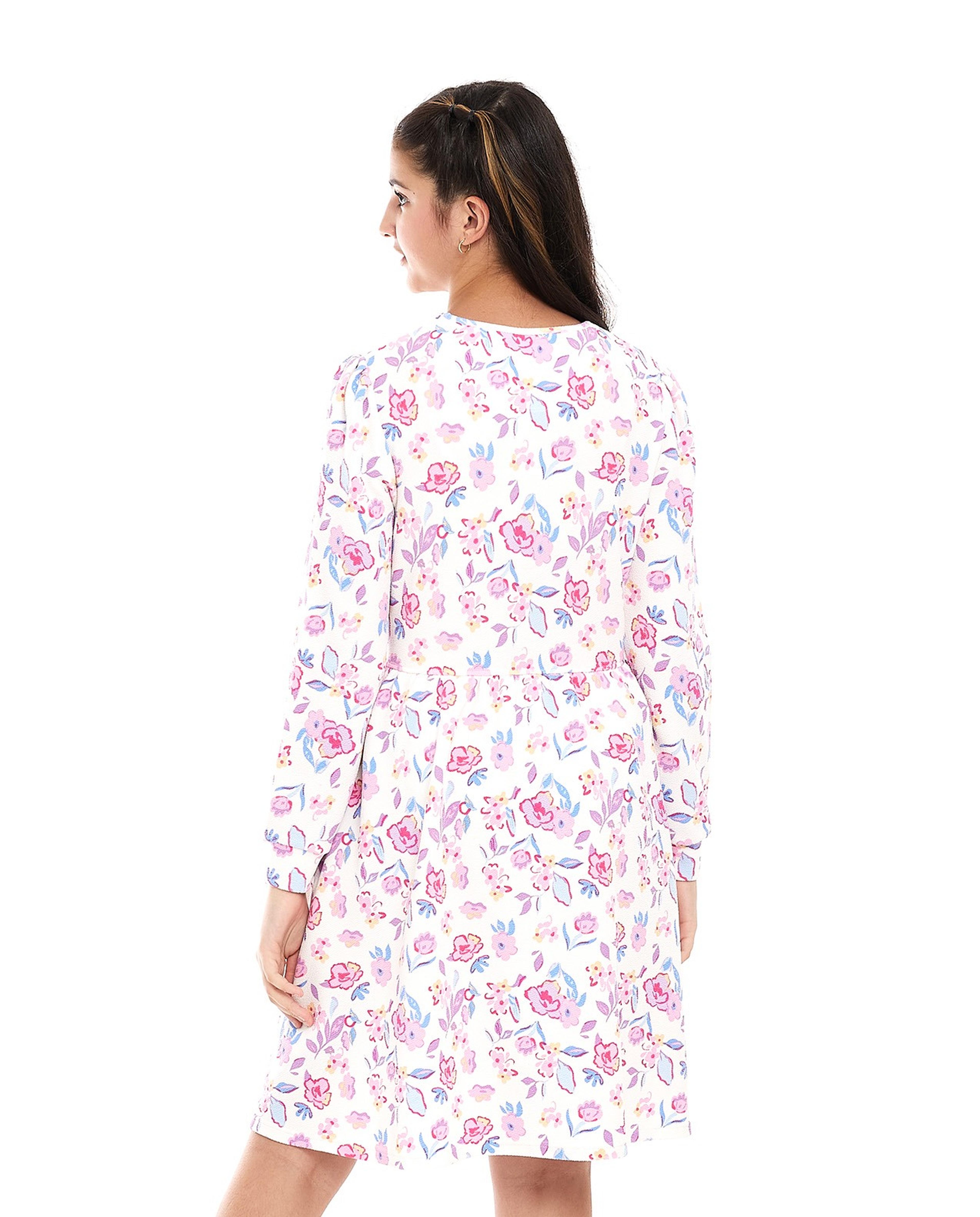 فستان مطبوع بنقشة زهور بياقة مستديرة وأكمام طويلة