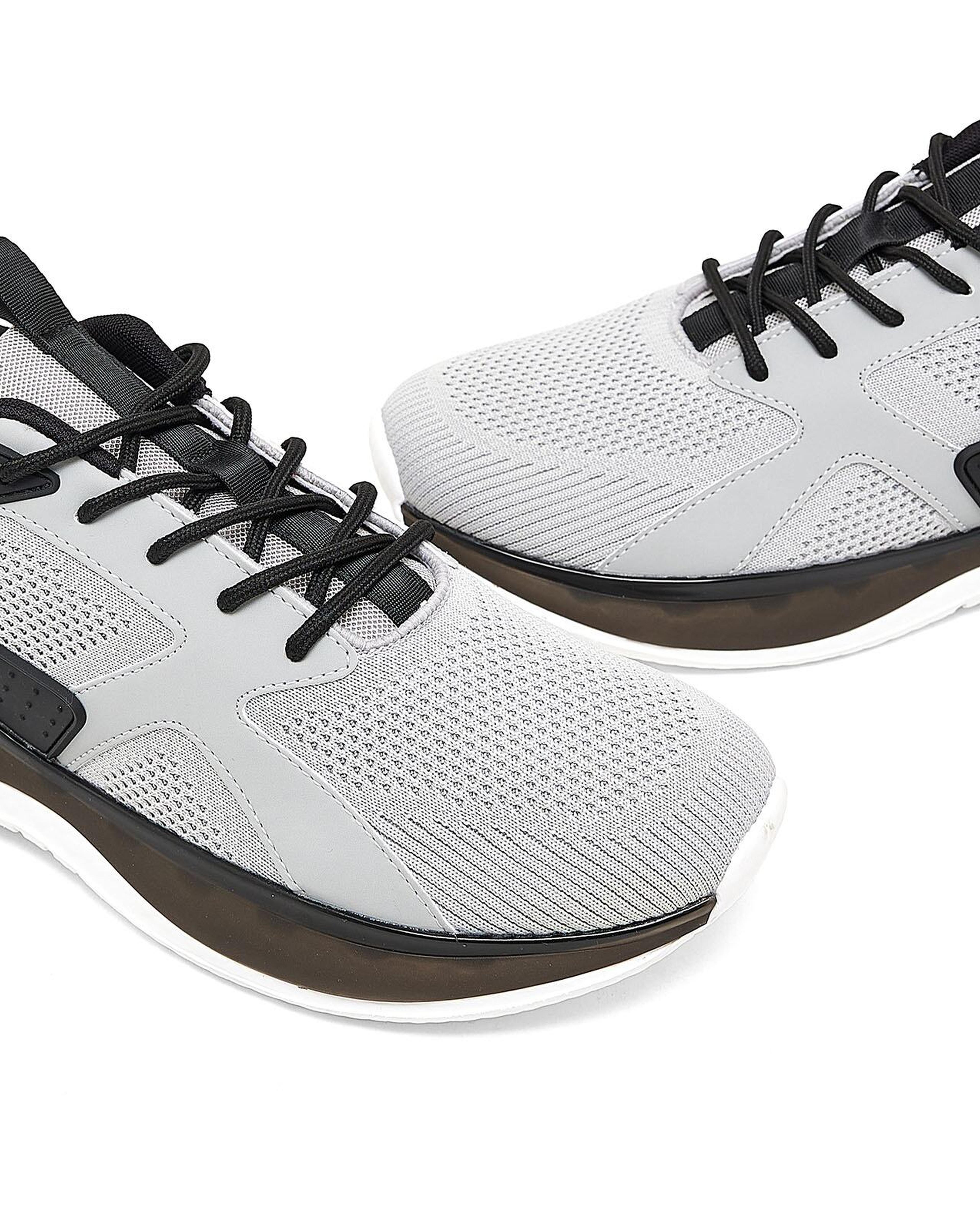 حذاء رياضي برباط منسوج