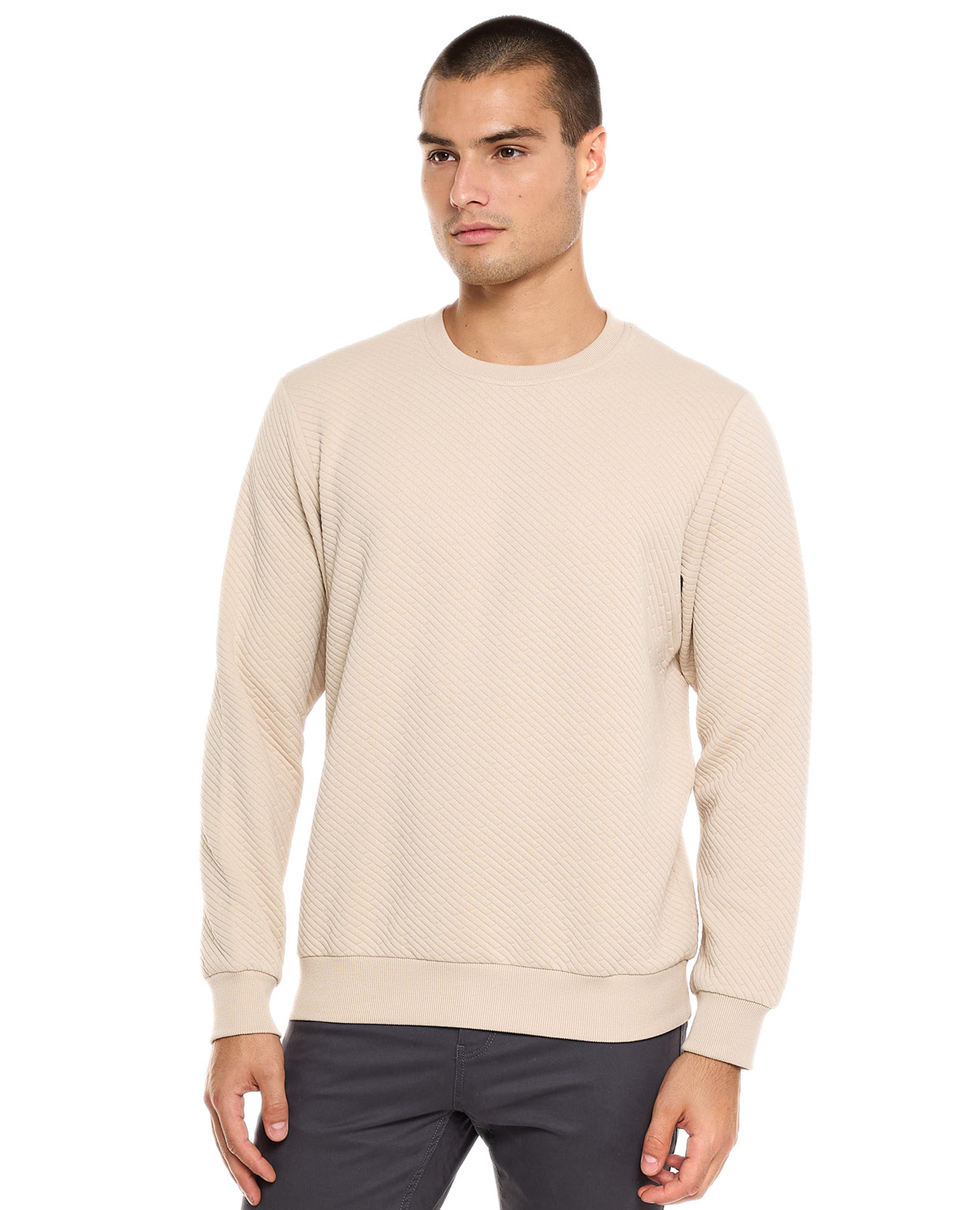 سويتر منقوش بياقة مستديرة وأكمام طويلة