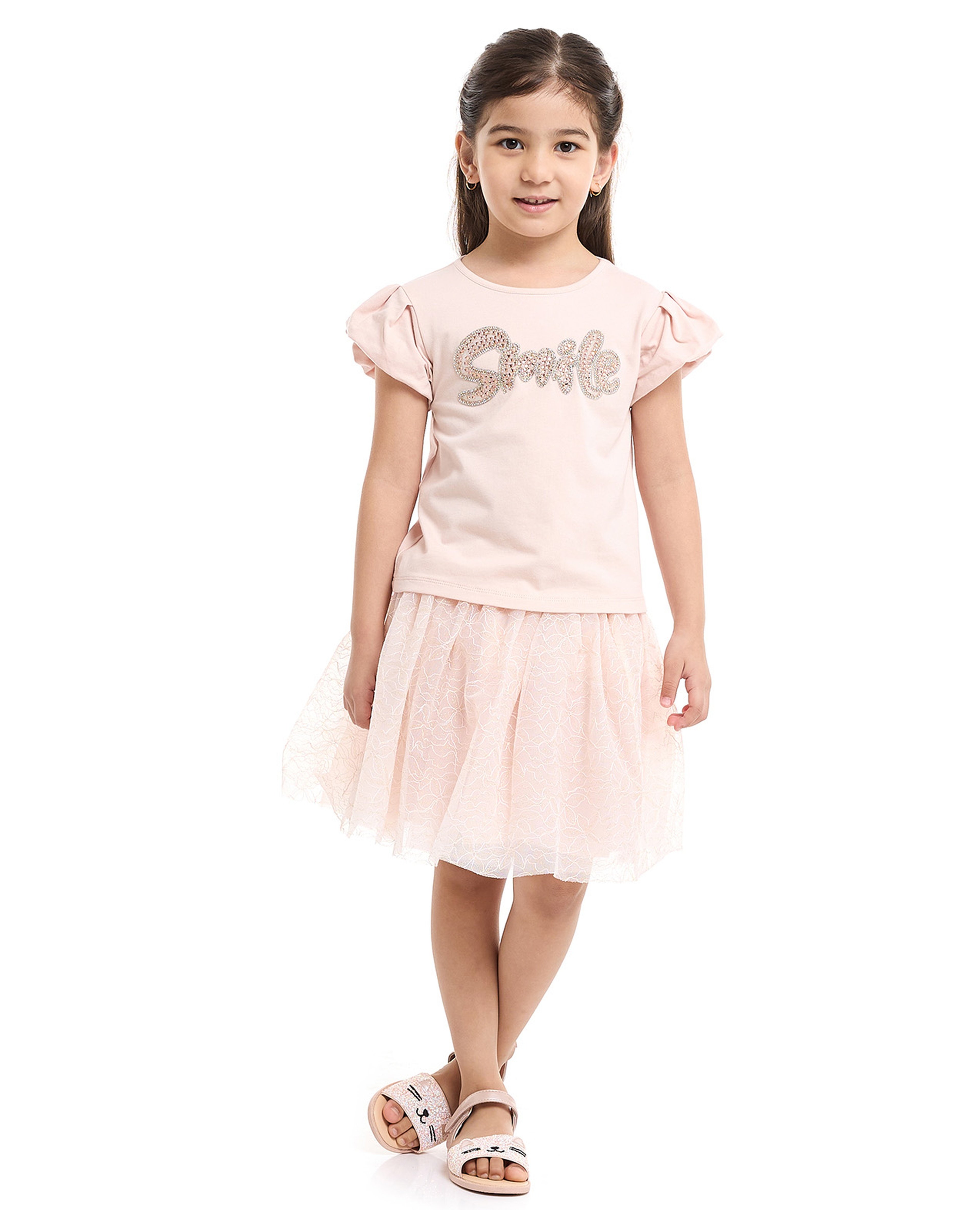 طقم توب مزخرف وتنورة