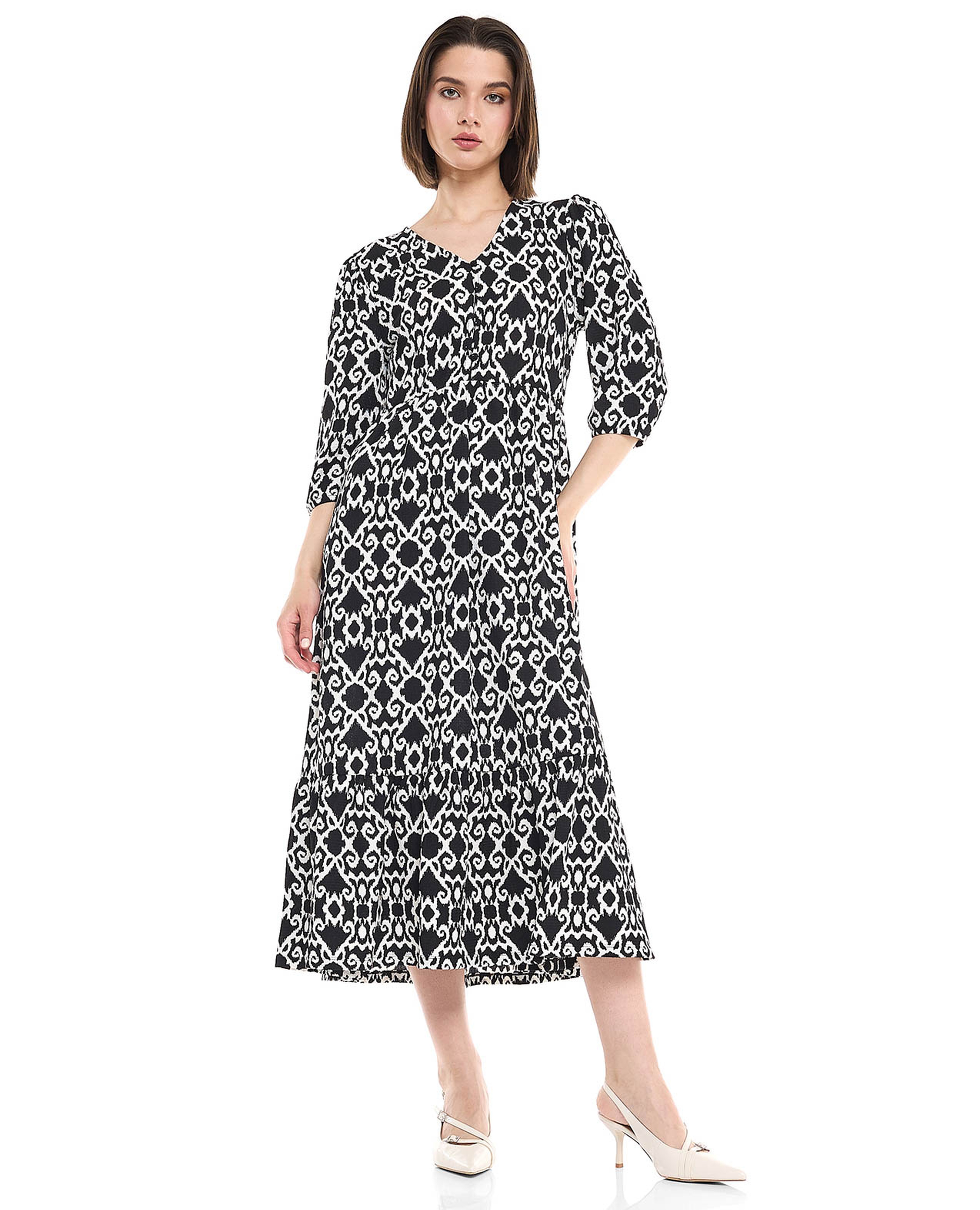 فستان ميدي بطبعة وياقة V وأكمام 3/4