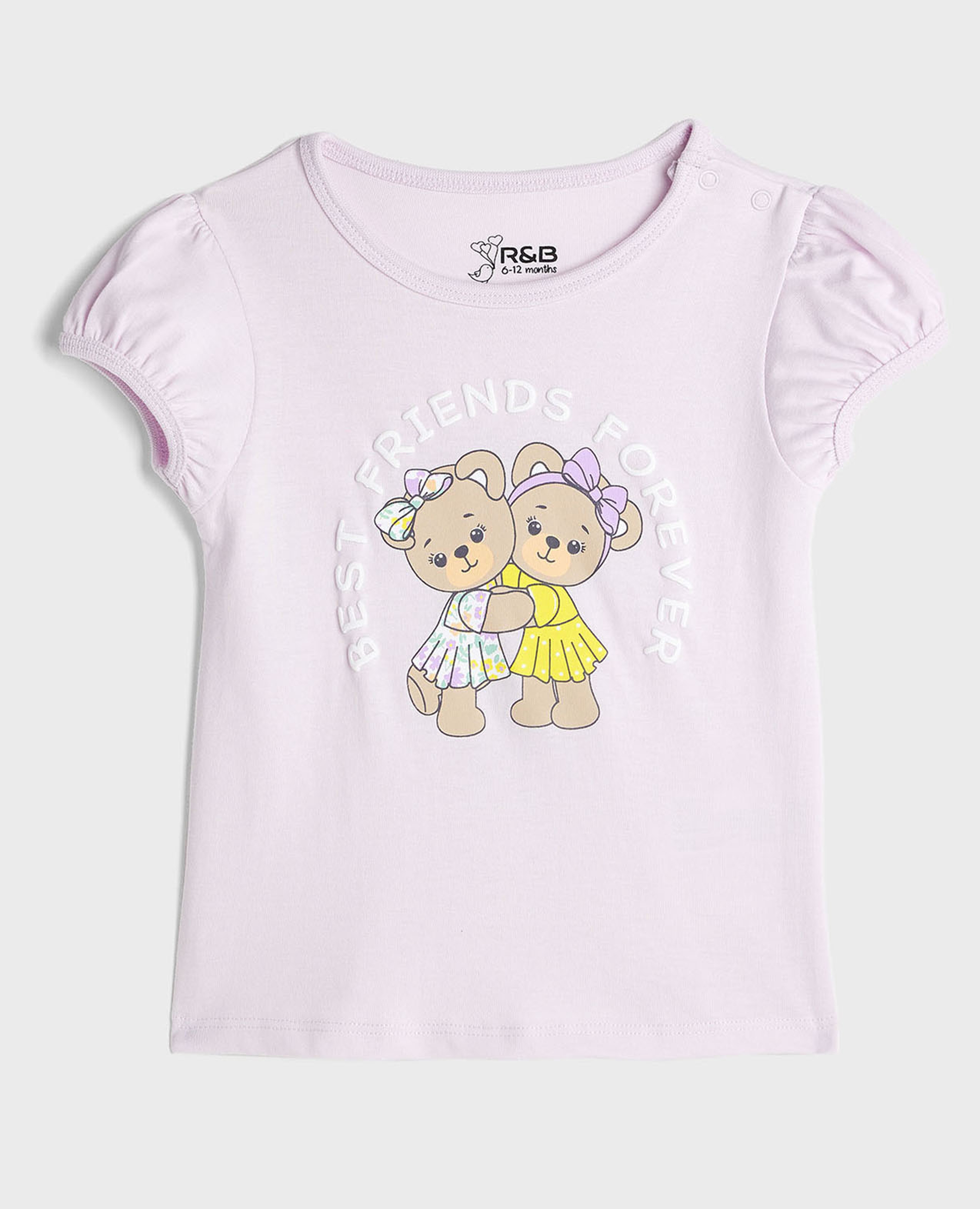 توب بطبعة بياقة مستديرة وأكمام منفوشة