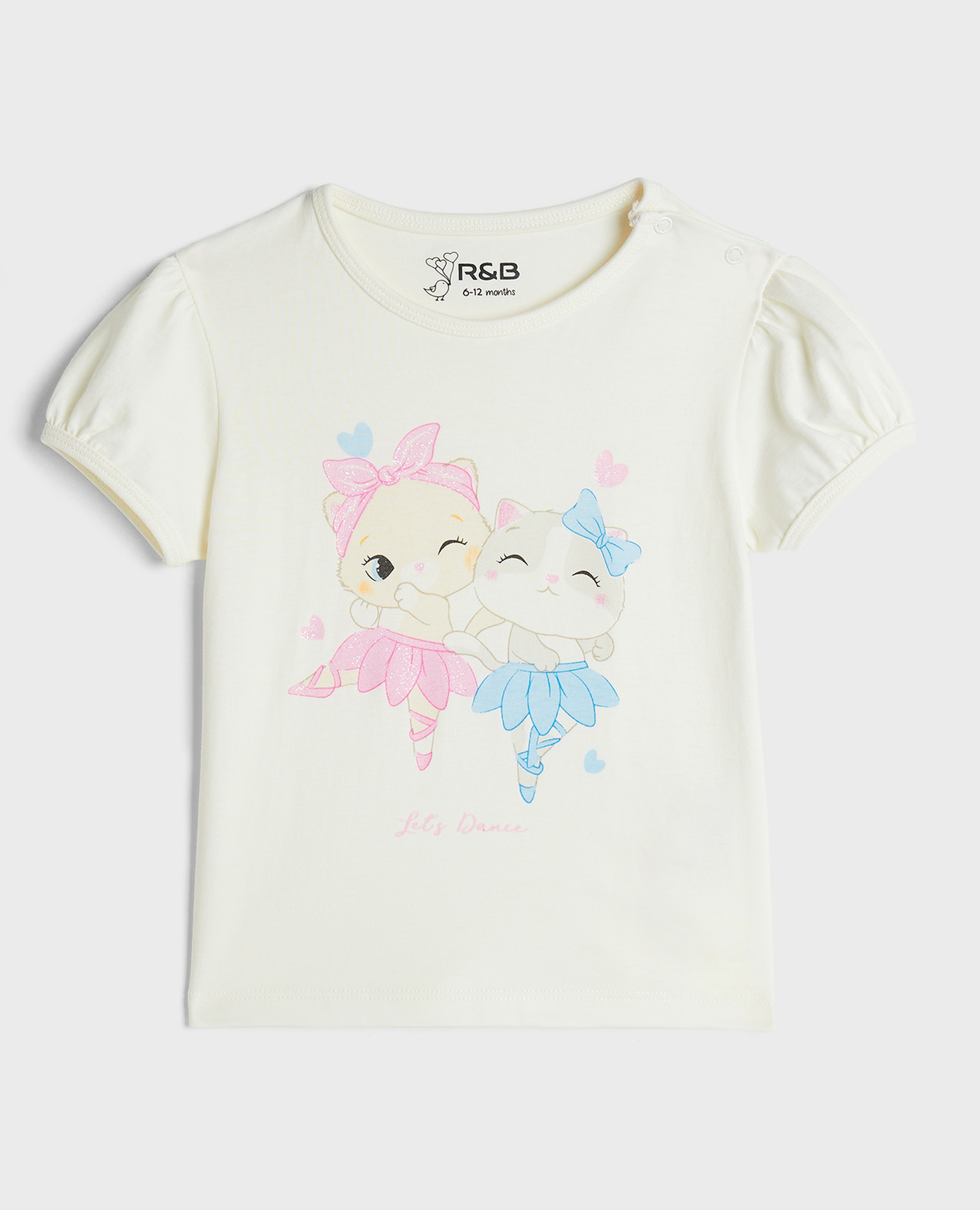 توب بطبعة بياقة مستديرة وأكمام منفوشة