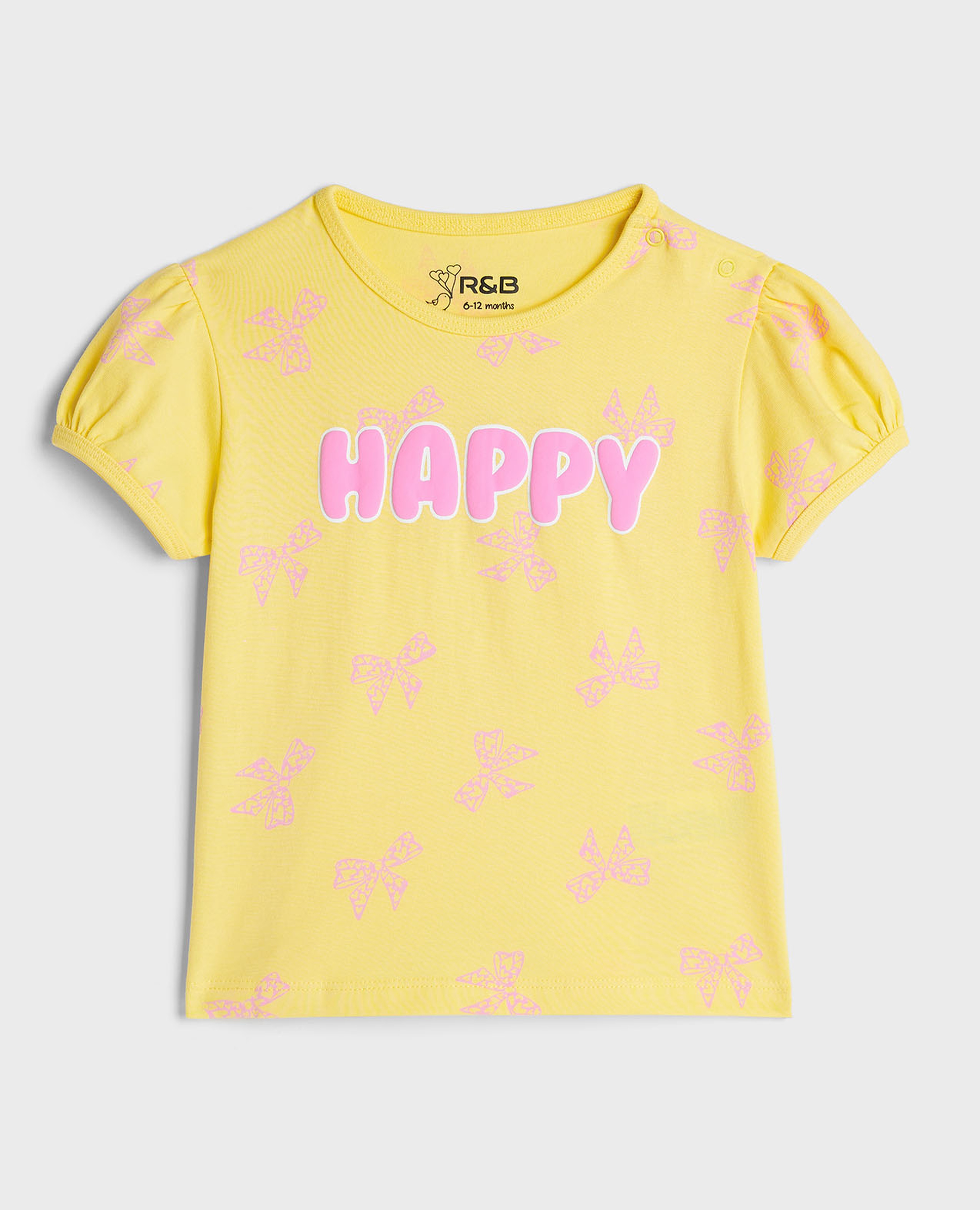 توب بطبعة بياقة مستديرة وأكمام منفوشة