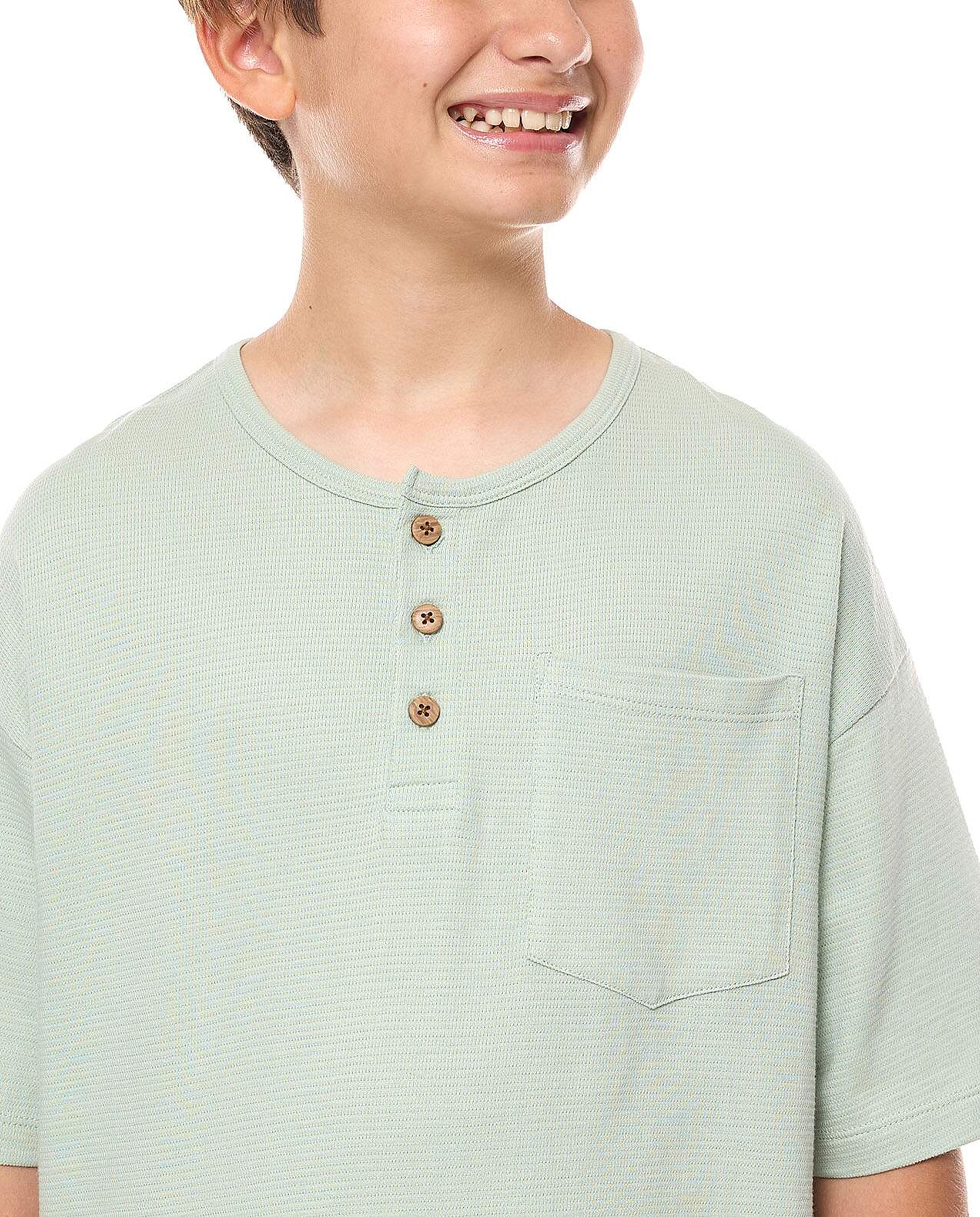 Pocket Detail Oversized T-Shirt with Henley Neck and Short Sleeves