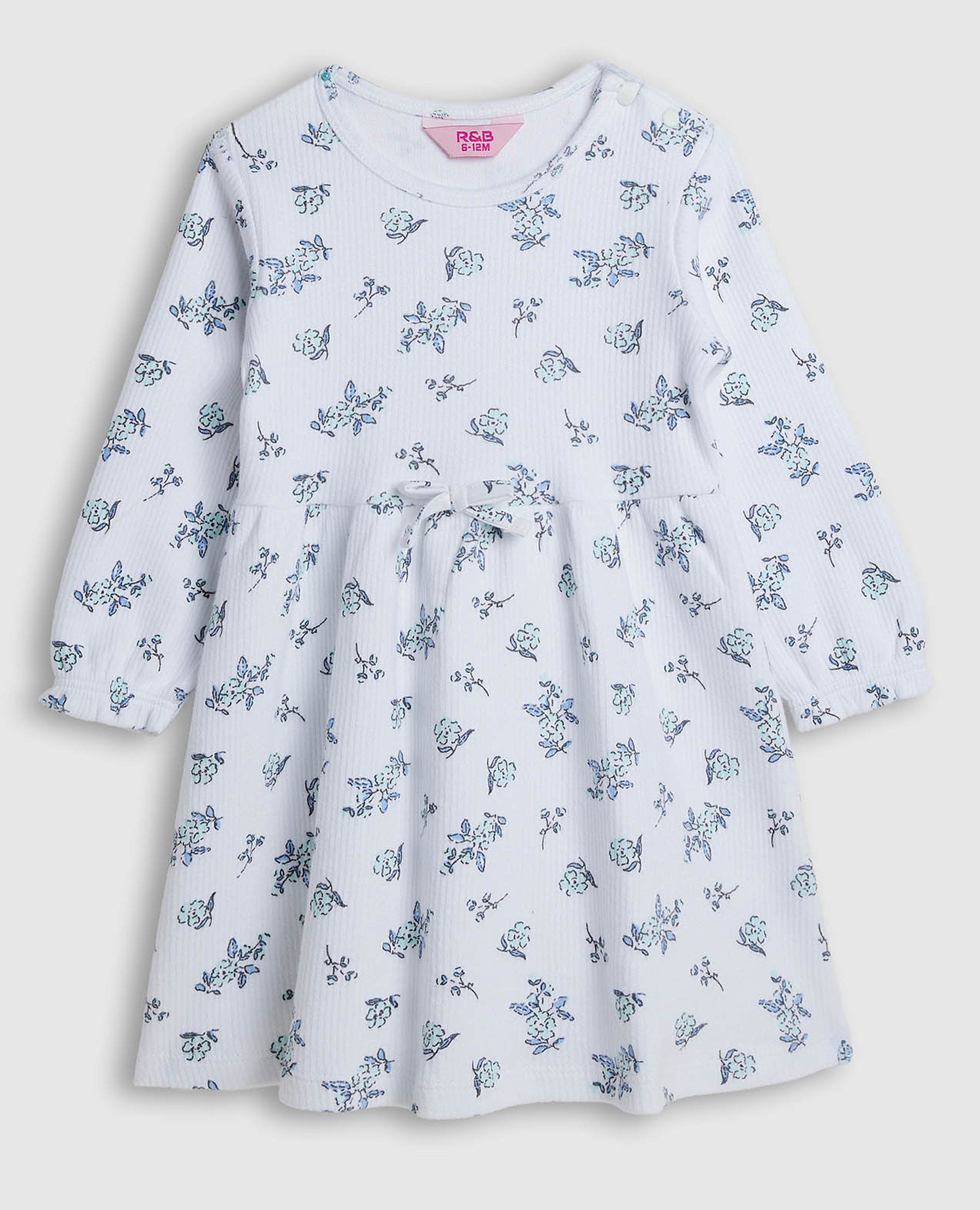 فستان واسع بطبعة وأكمام طويلة