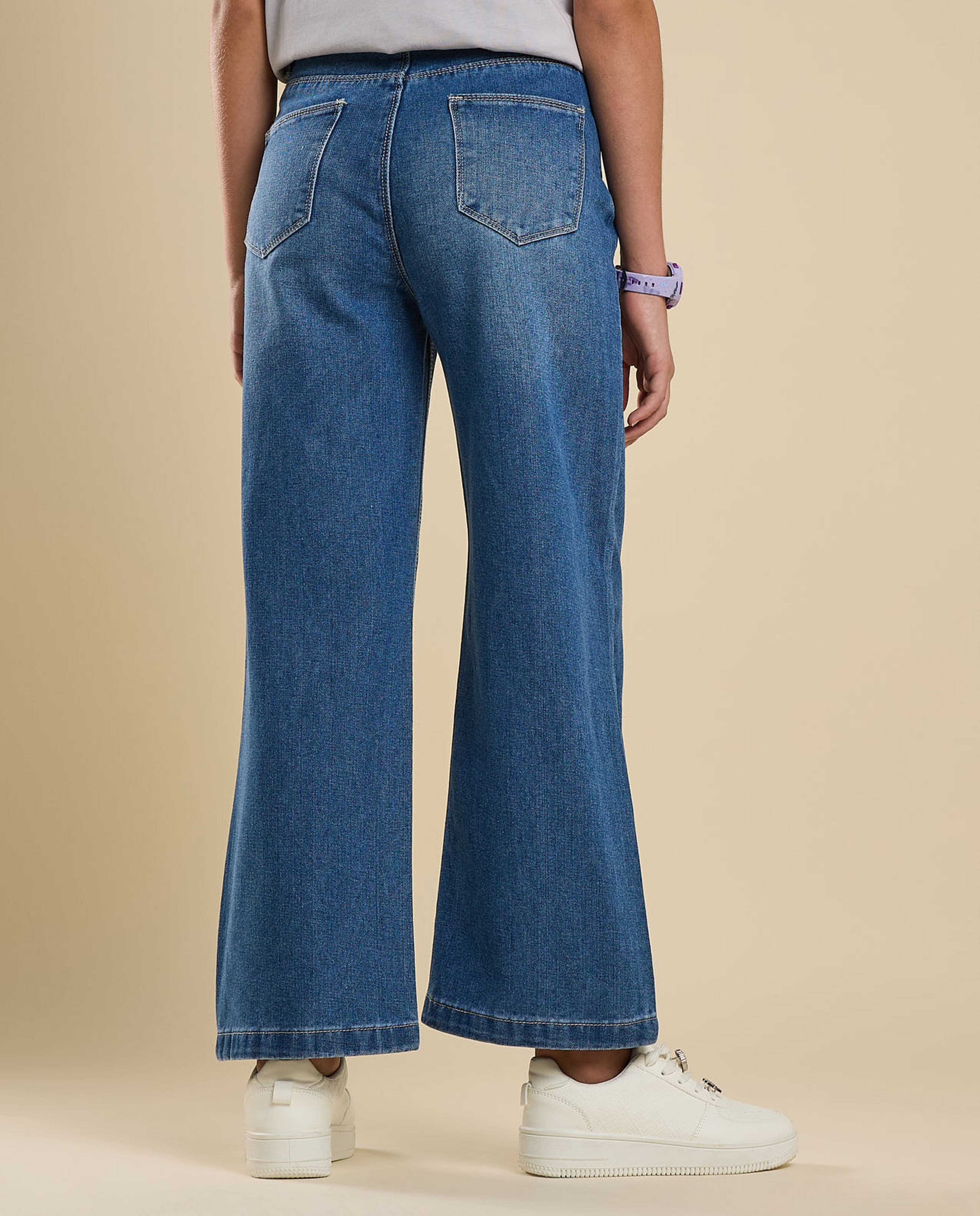 Faded Wide Leg Jeans with Button Closure
