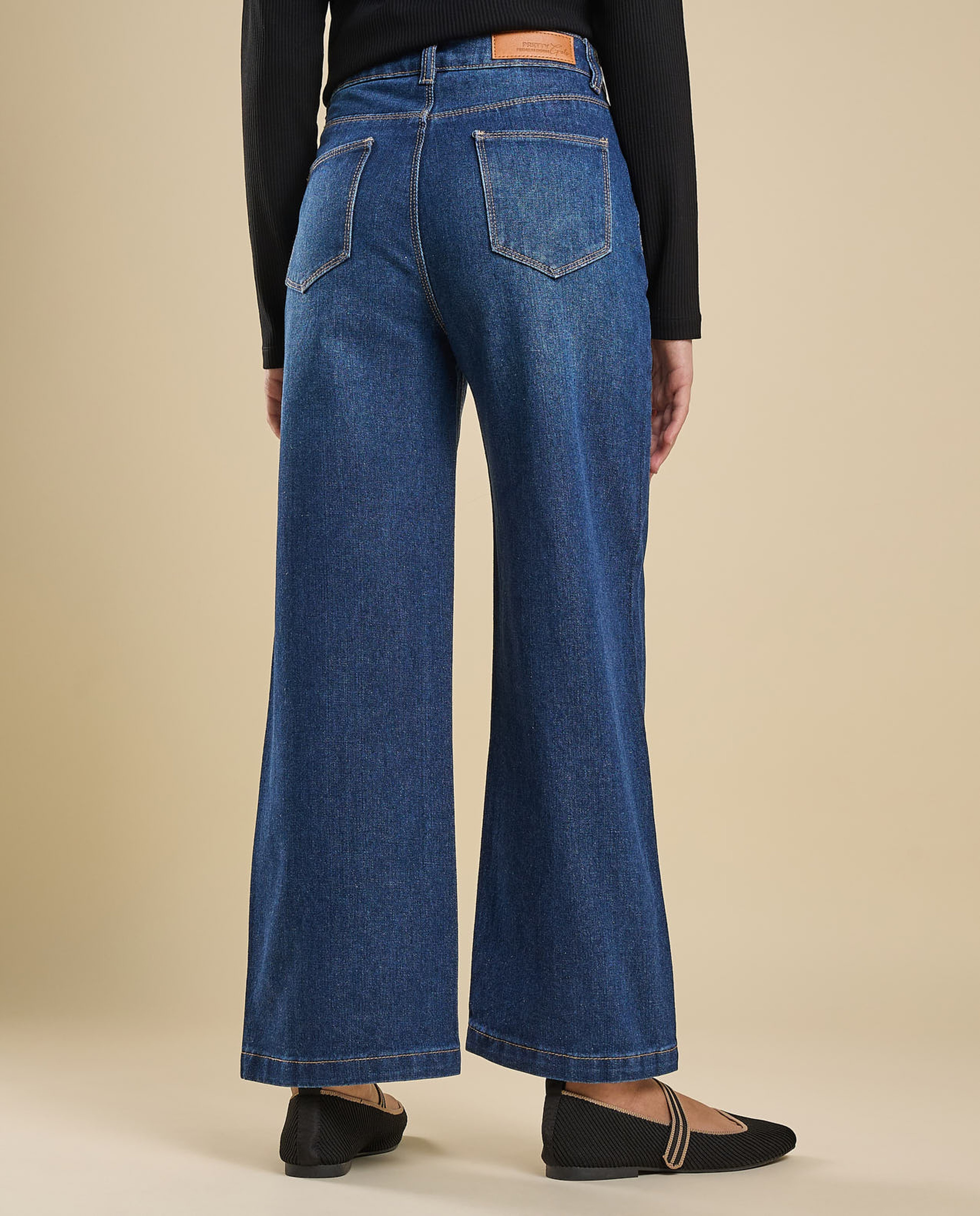 Faded Wide Leg Jeans with Button Closure