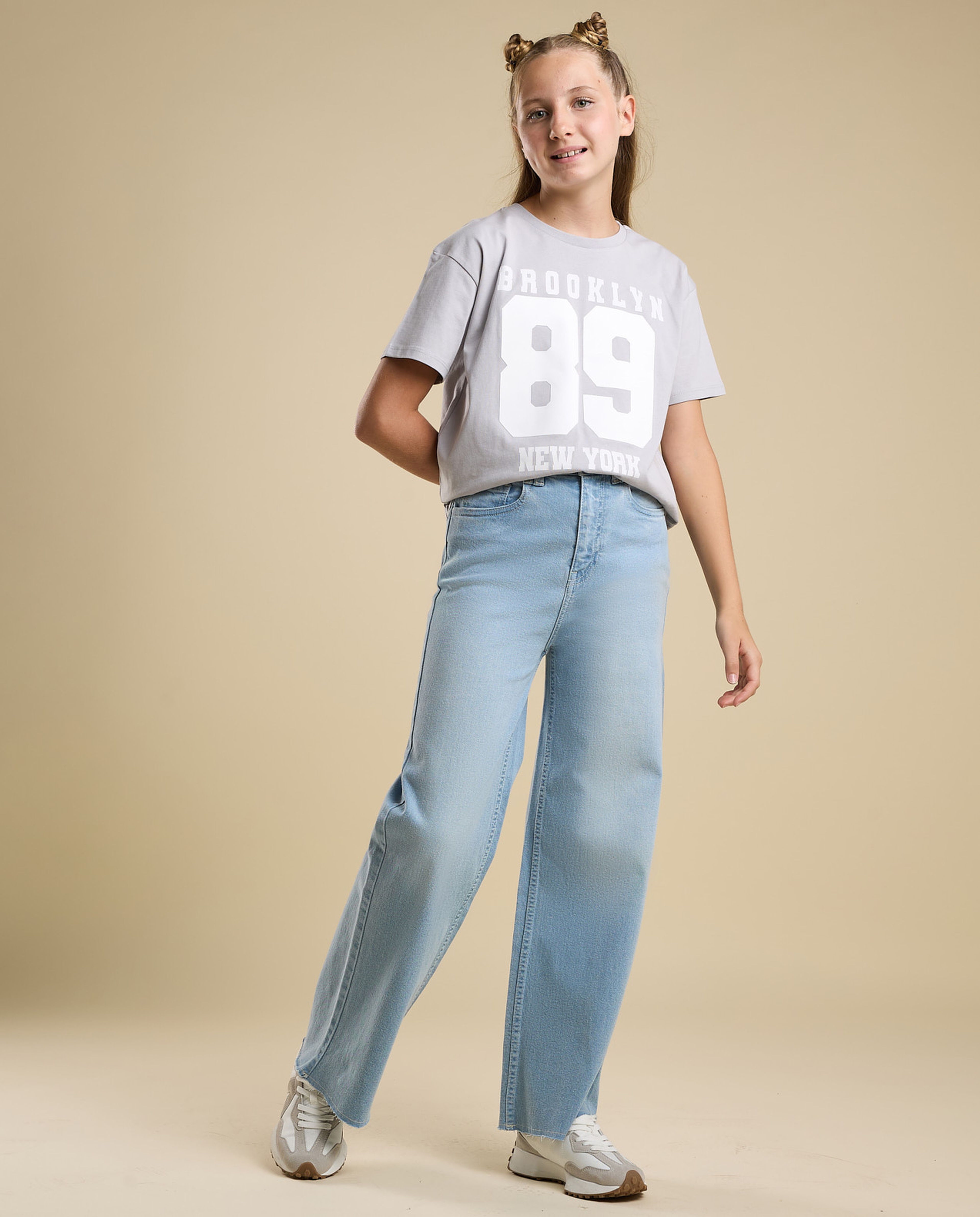 Faded Wide Leg Jeans with Button Closure