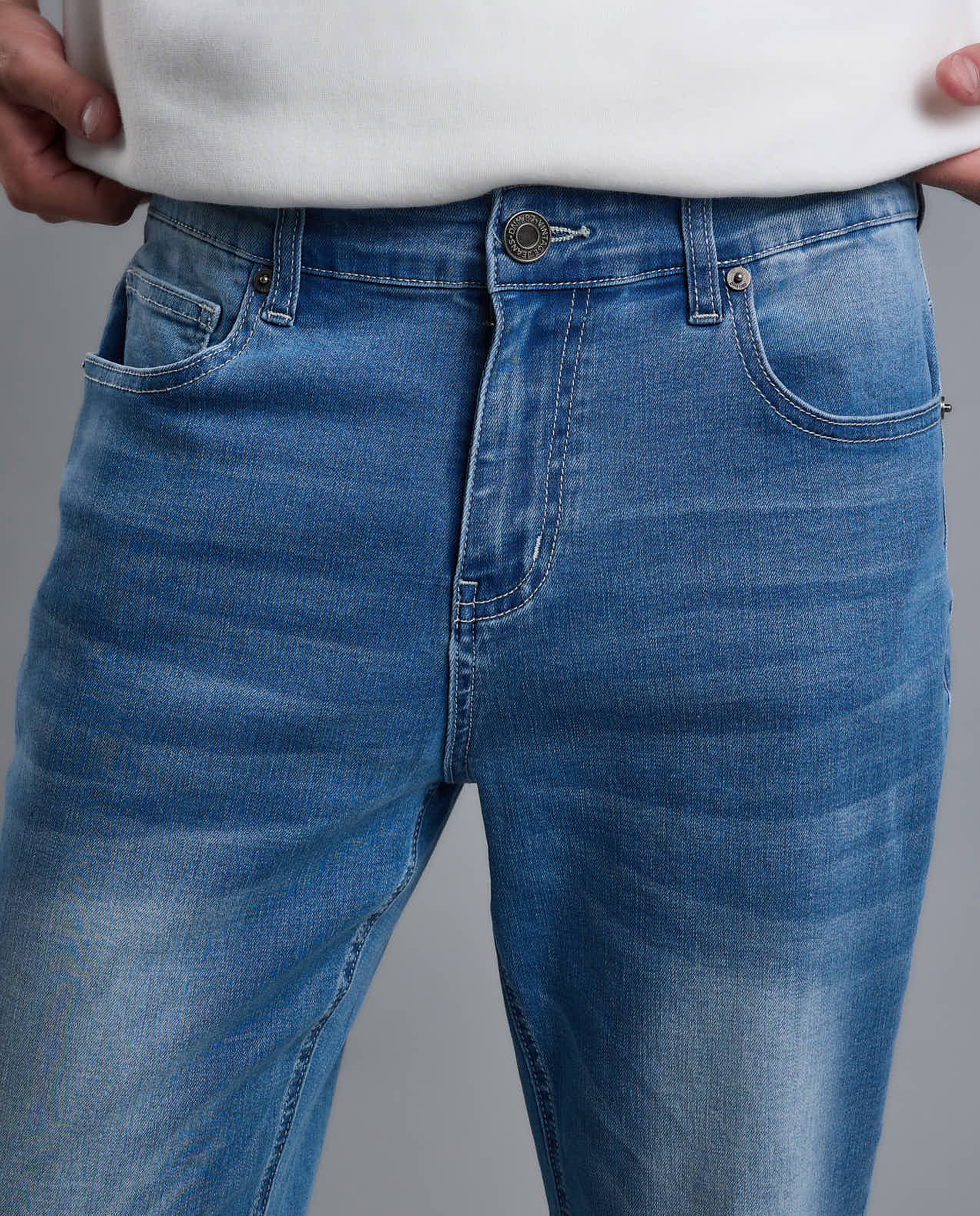 Faded Carrot Fit Jeans with Button Closure
