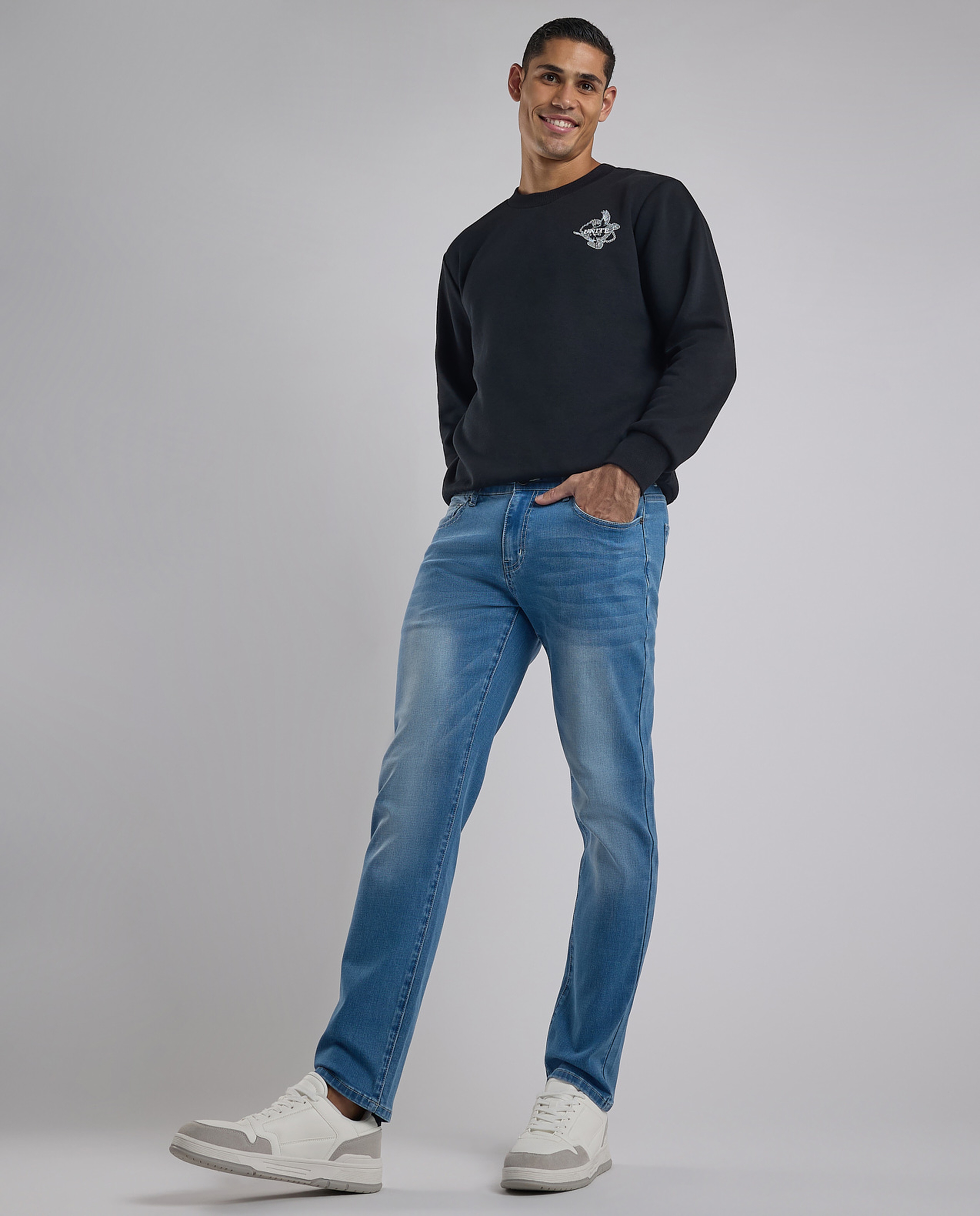 Faded Slim Fit Jeans with Button Closure