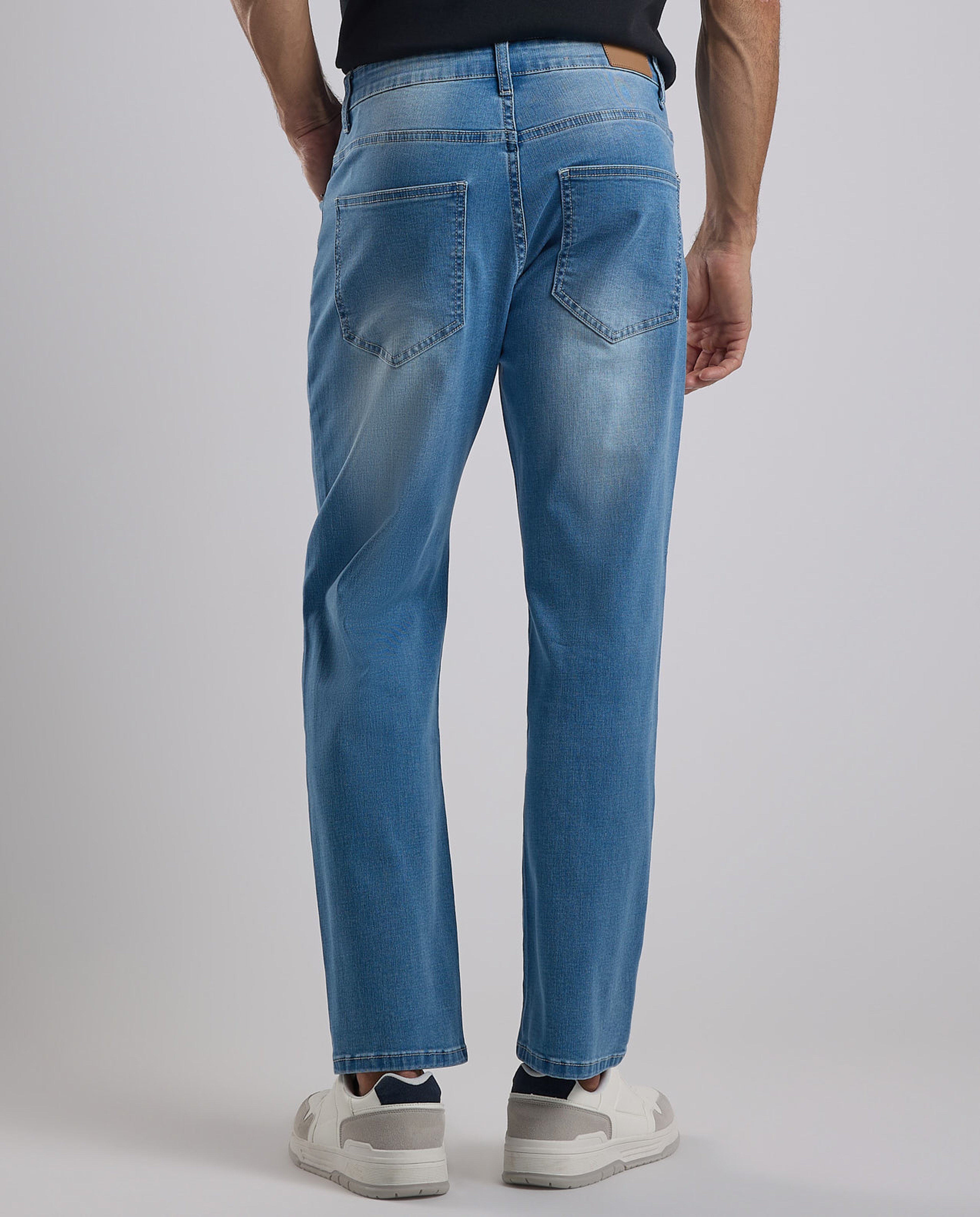 Faded Tapered Fit Jeans with Button Closure