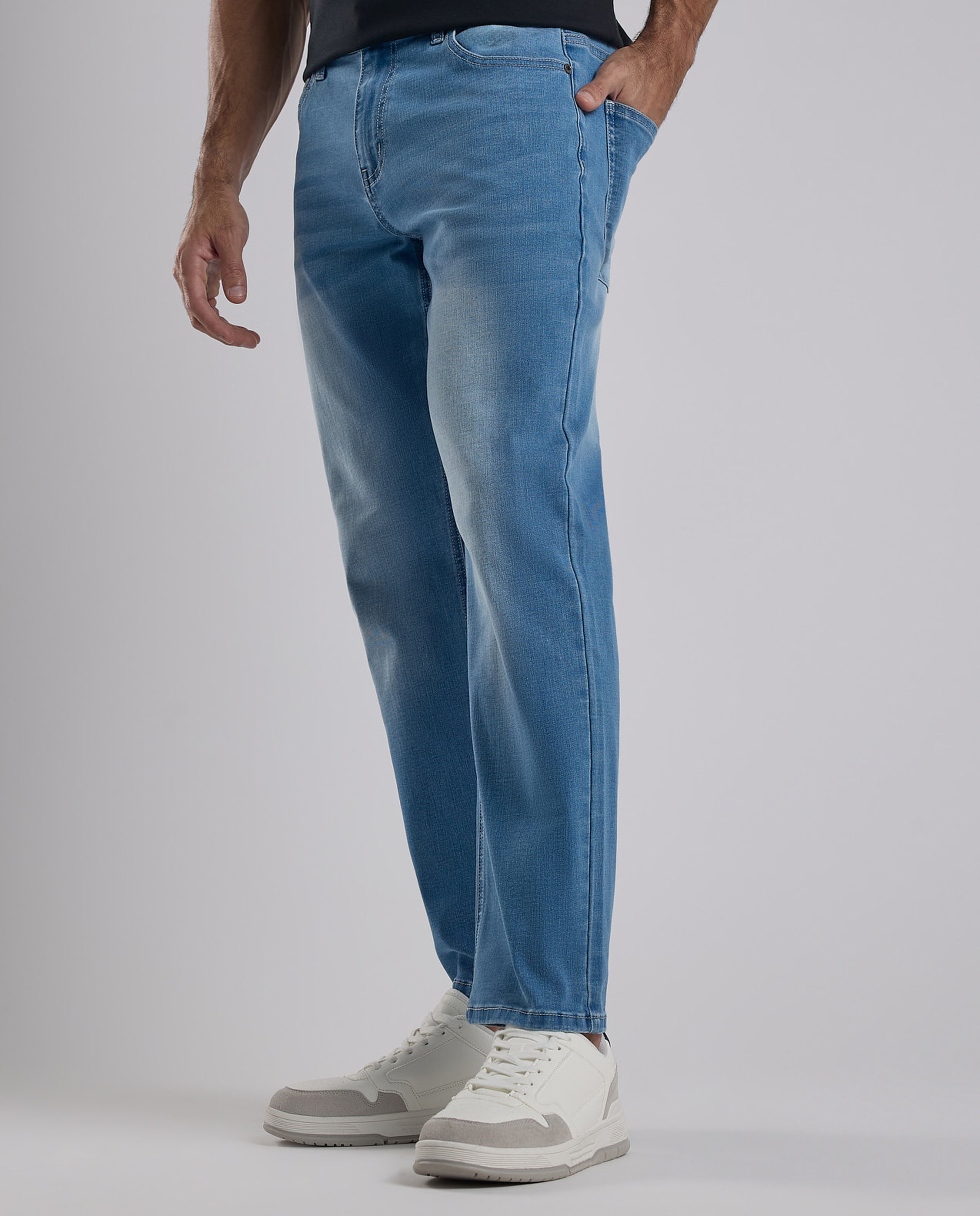 Faded Tapered Fit Jeans with Button Closure