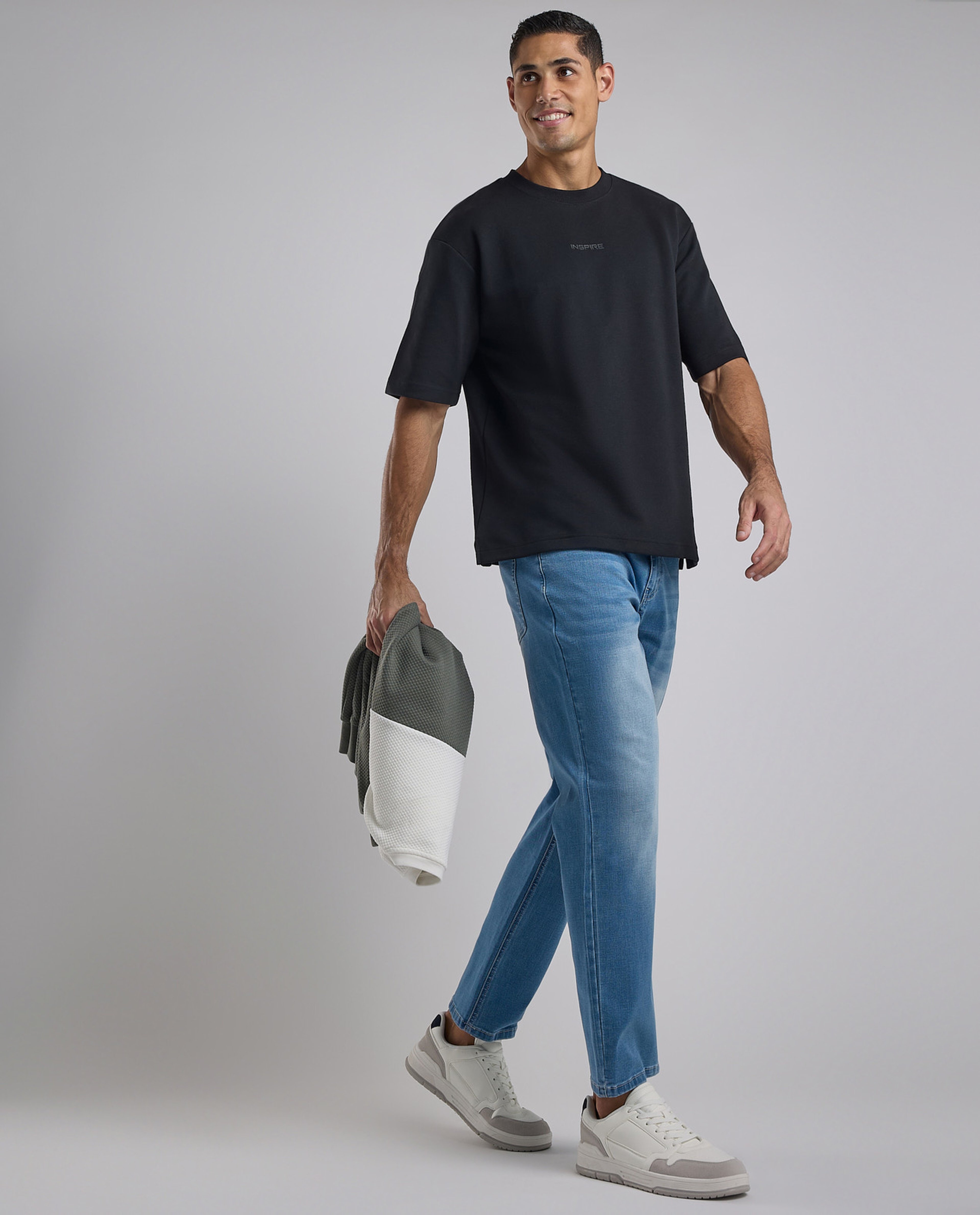 Faded Tapered Fit Jeans with Button Closure