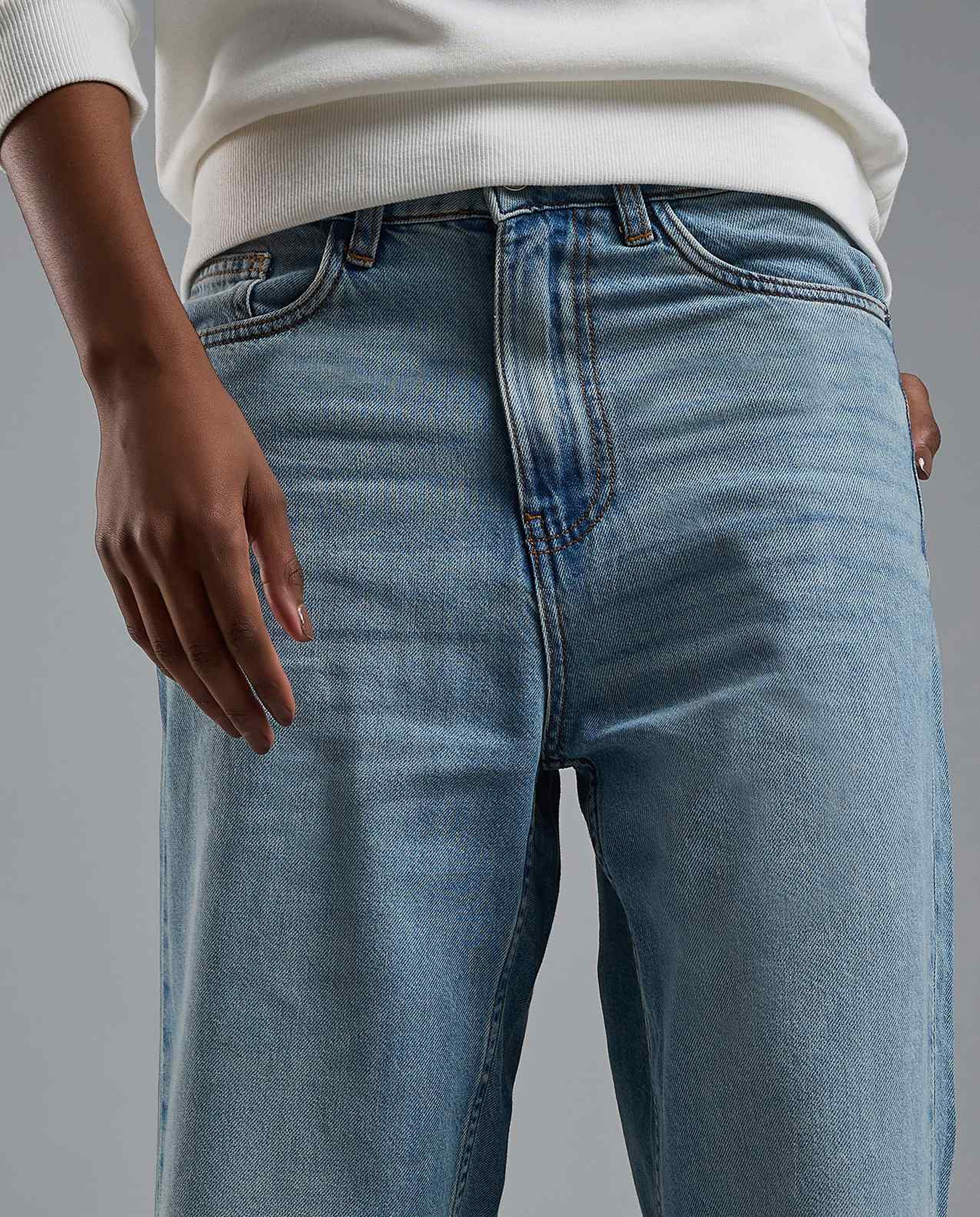 Faded Baggy Jeans with Button Closure