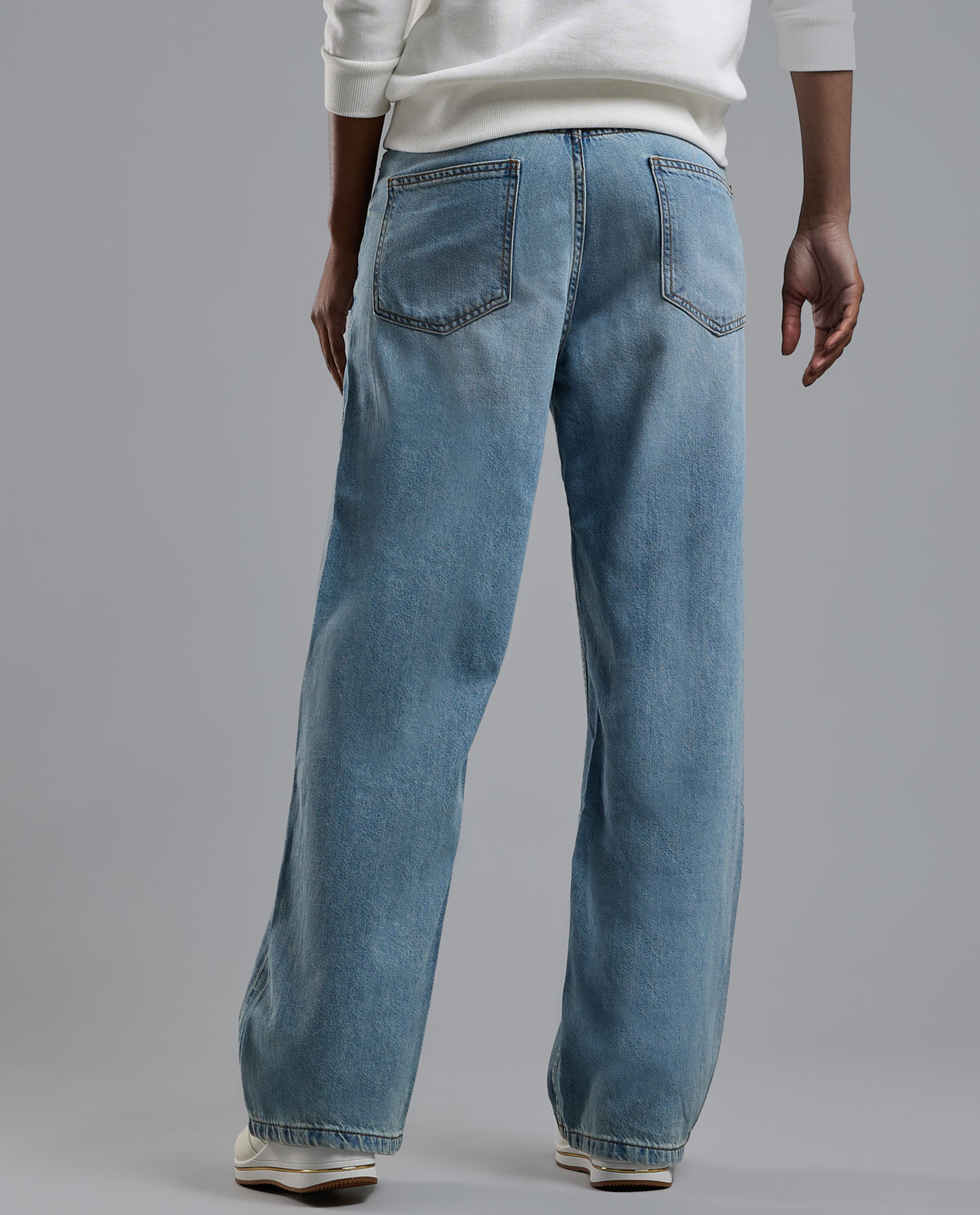 Faded Baggy Jeans with Button Closure