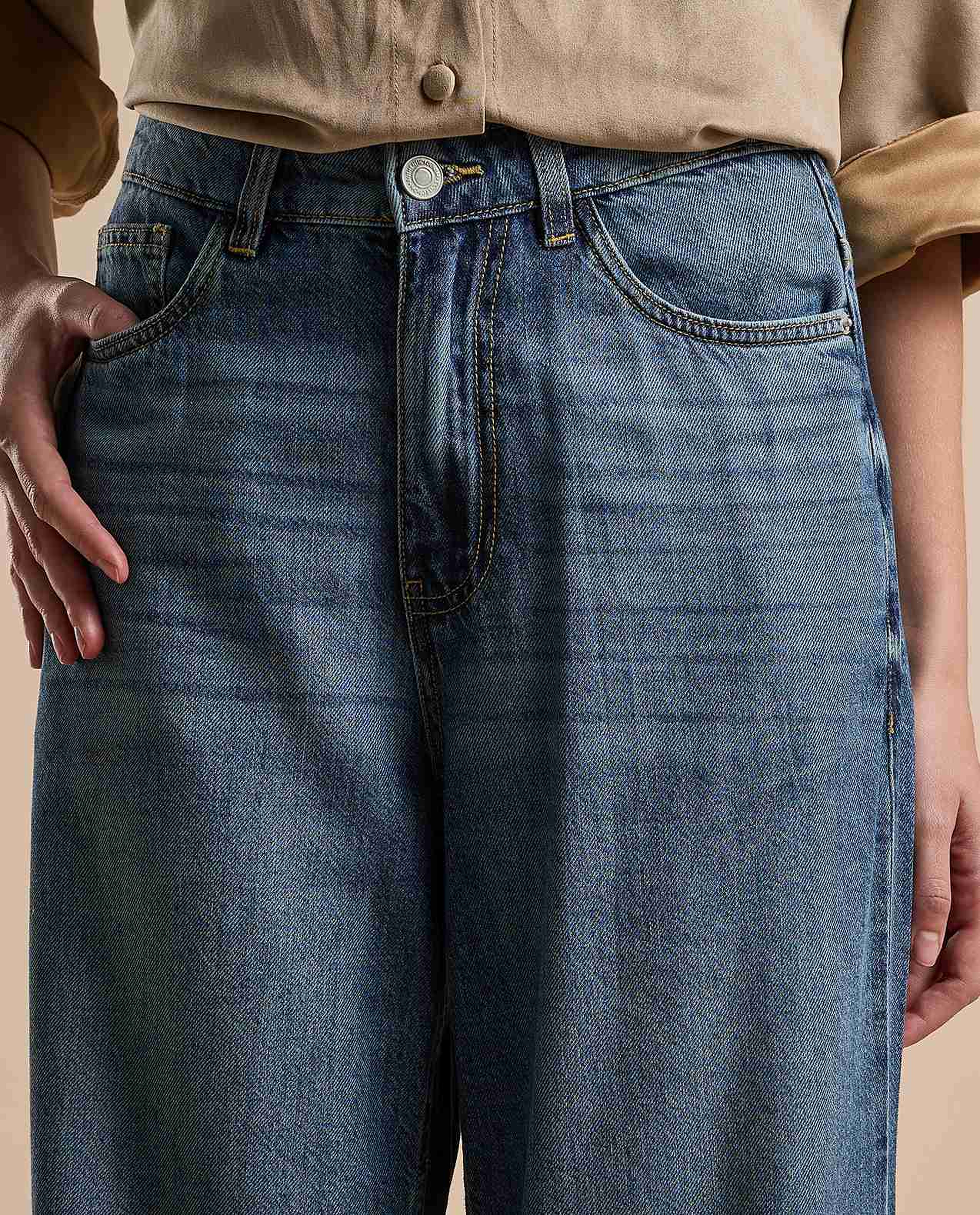 Faded Baggy Jeans with Button Closure