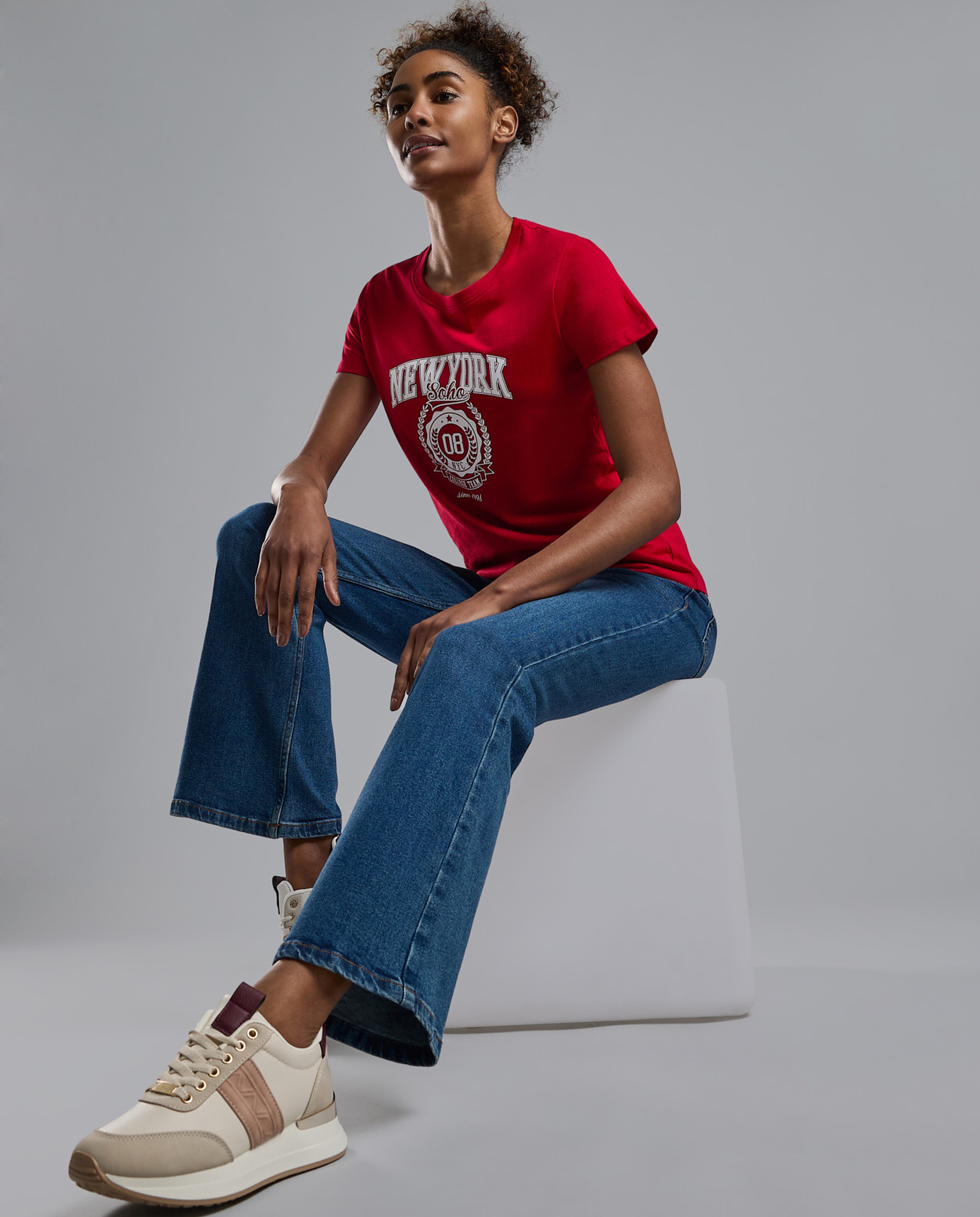 Washed Flared Jeans with Button Closure