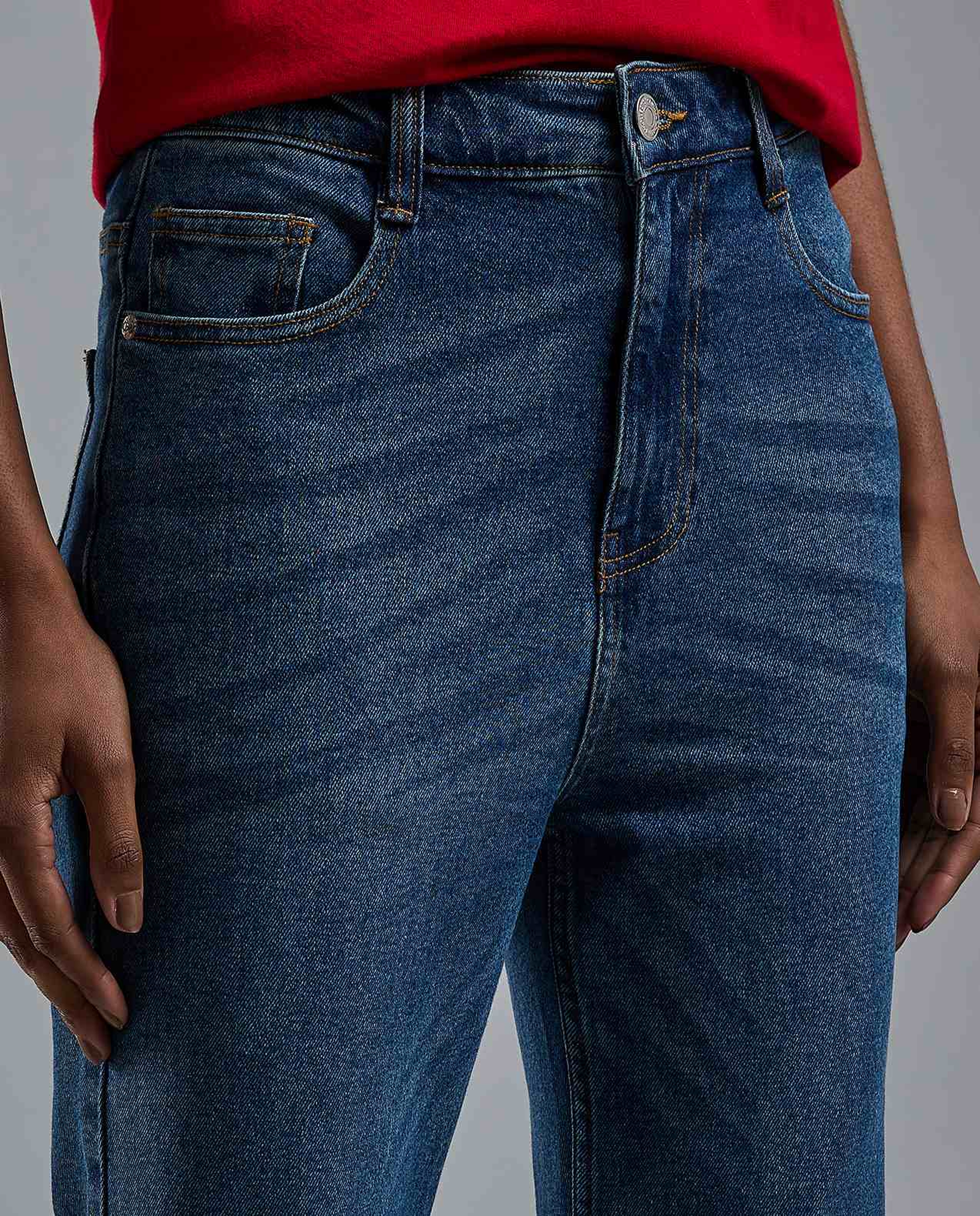 Washed Flared Jeans with Button Closure
