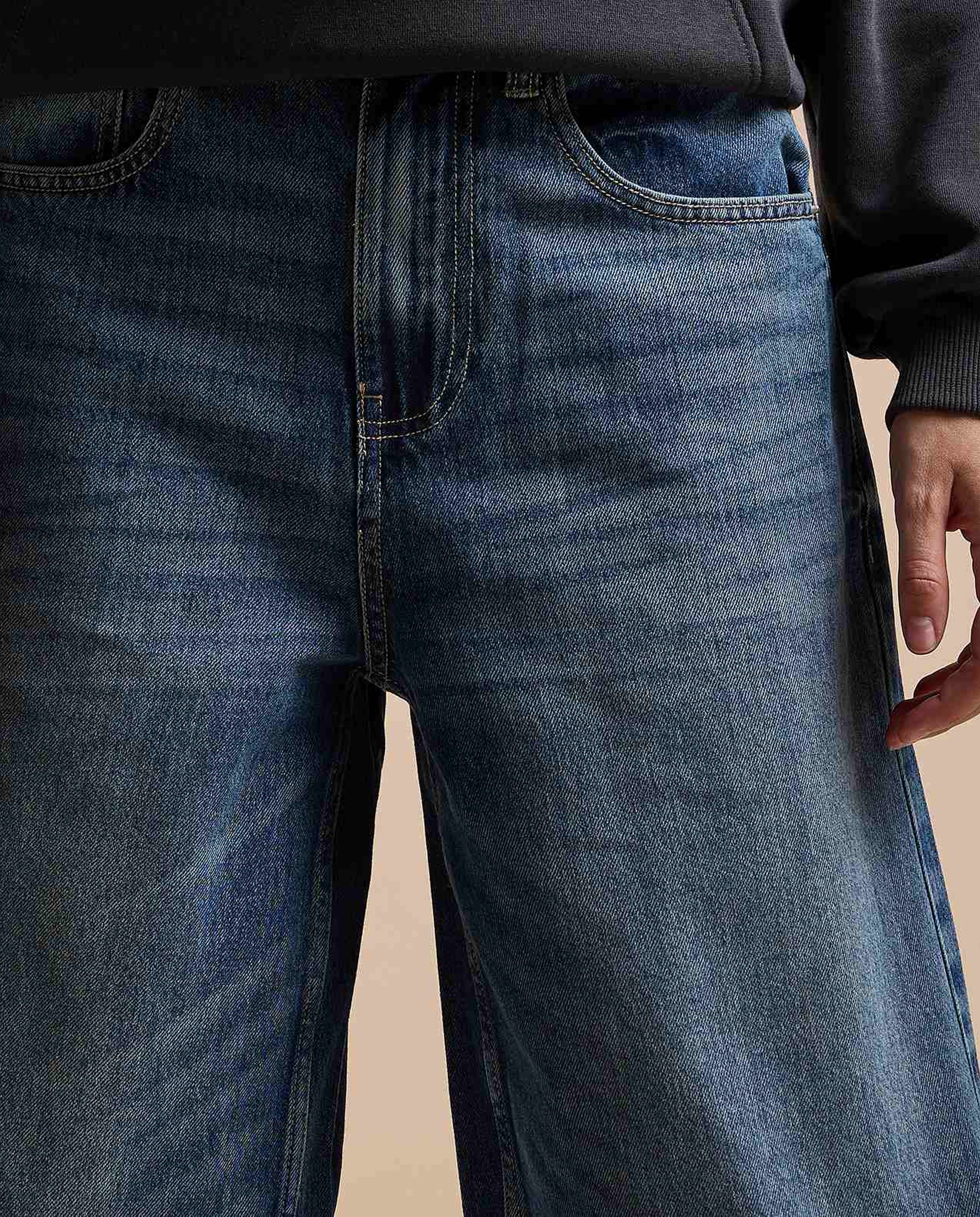 Faded Baggy Jeans with Button Closure