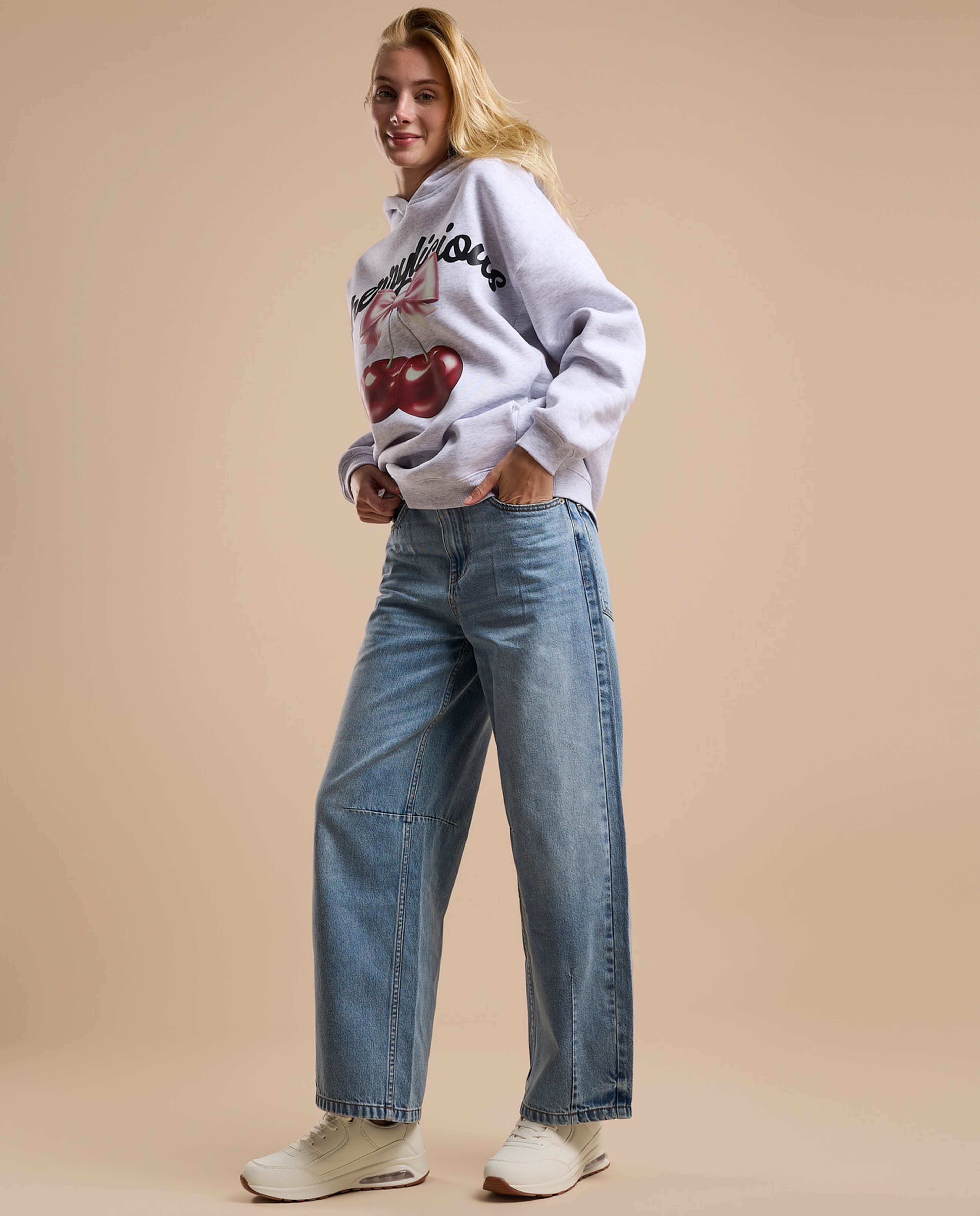 Faded Baggy Jeans with Button Closure