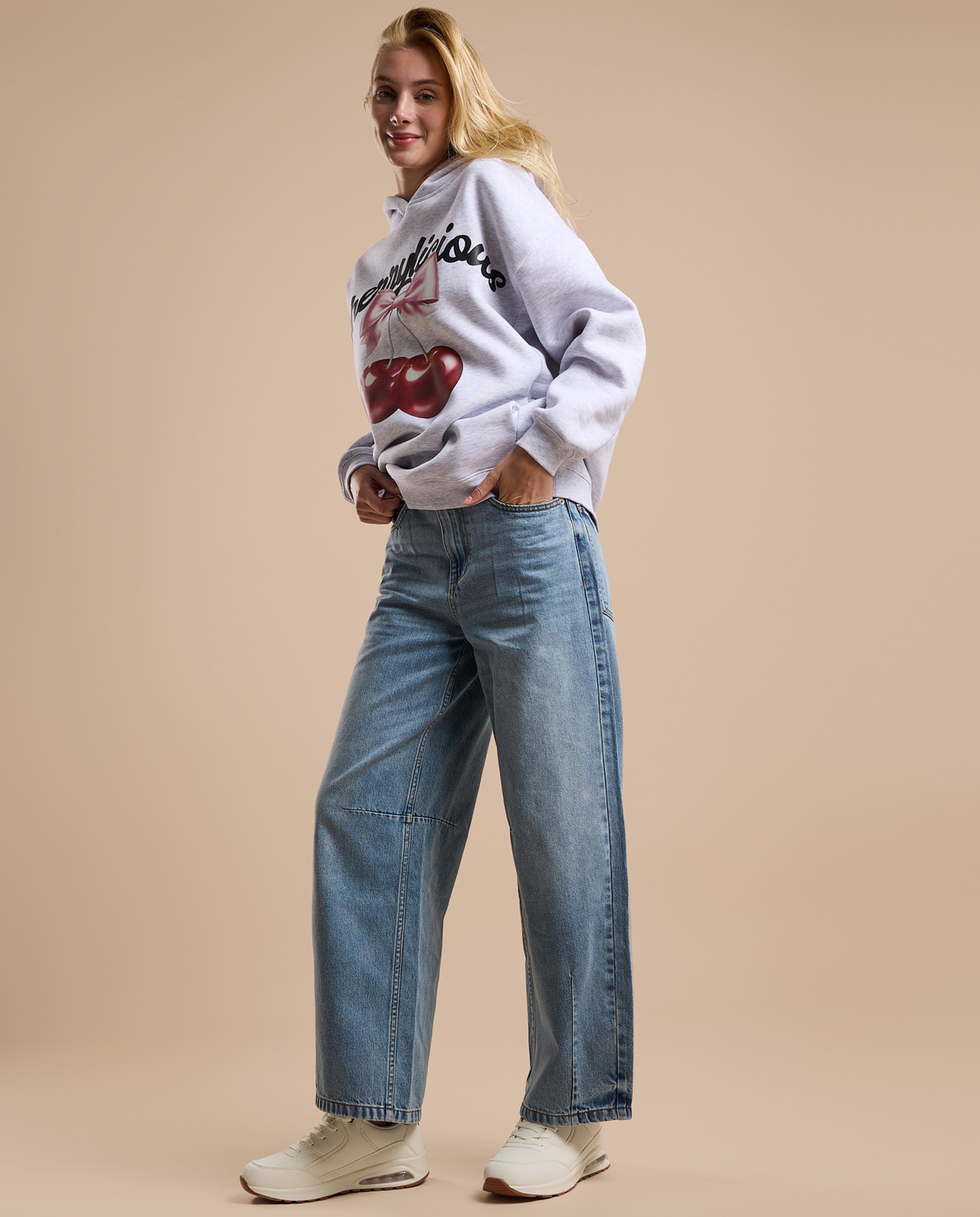 Faded Baggy Jeans with Button Closure