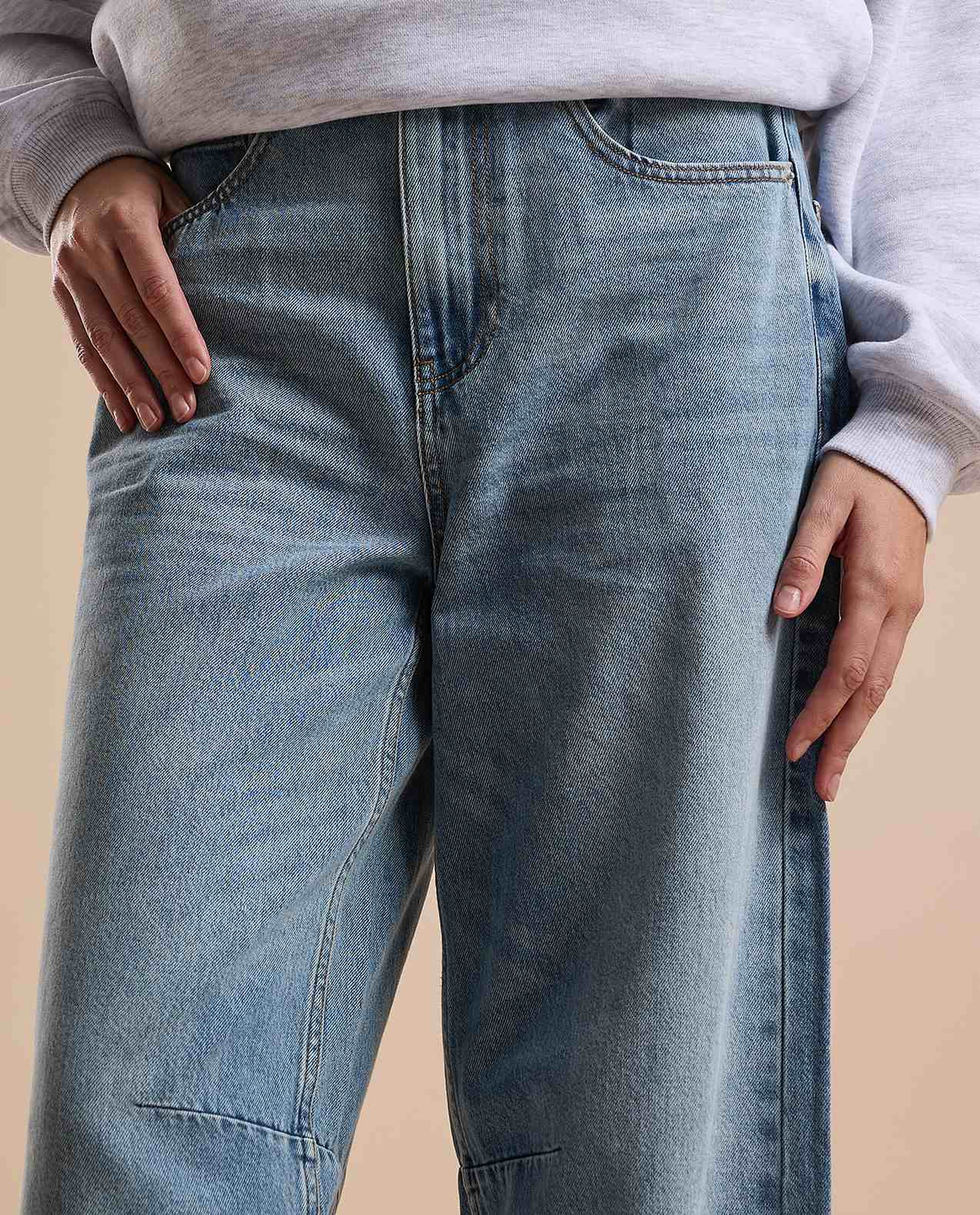 Faded Baggy Jeans with Button Closure