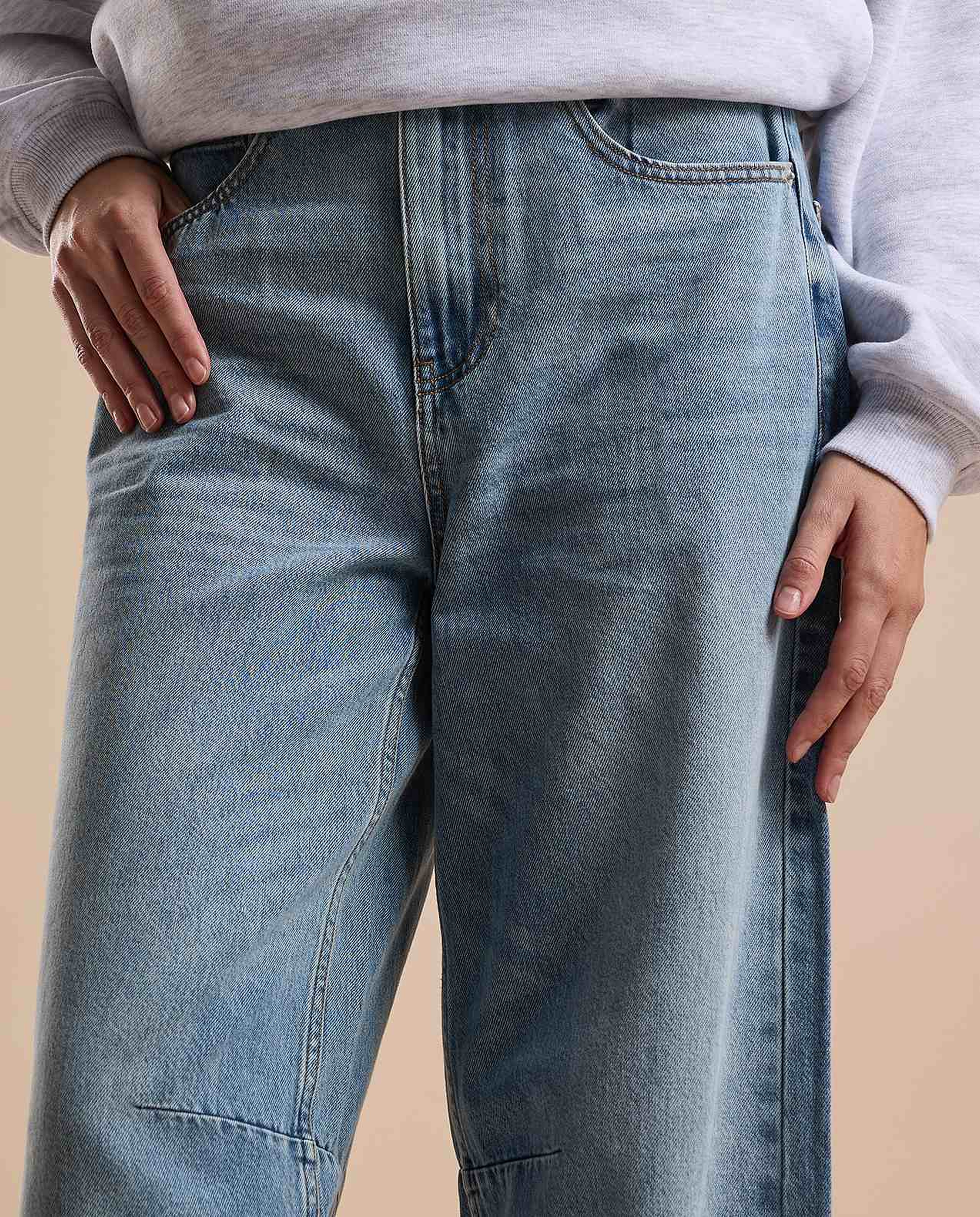 Faded Baggy Jeans with Button Closure
