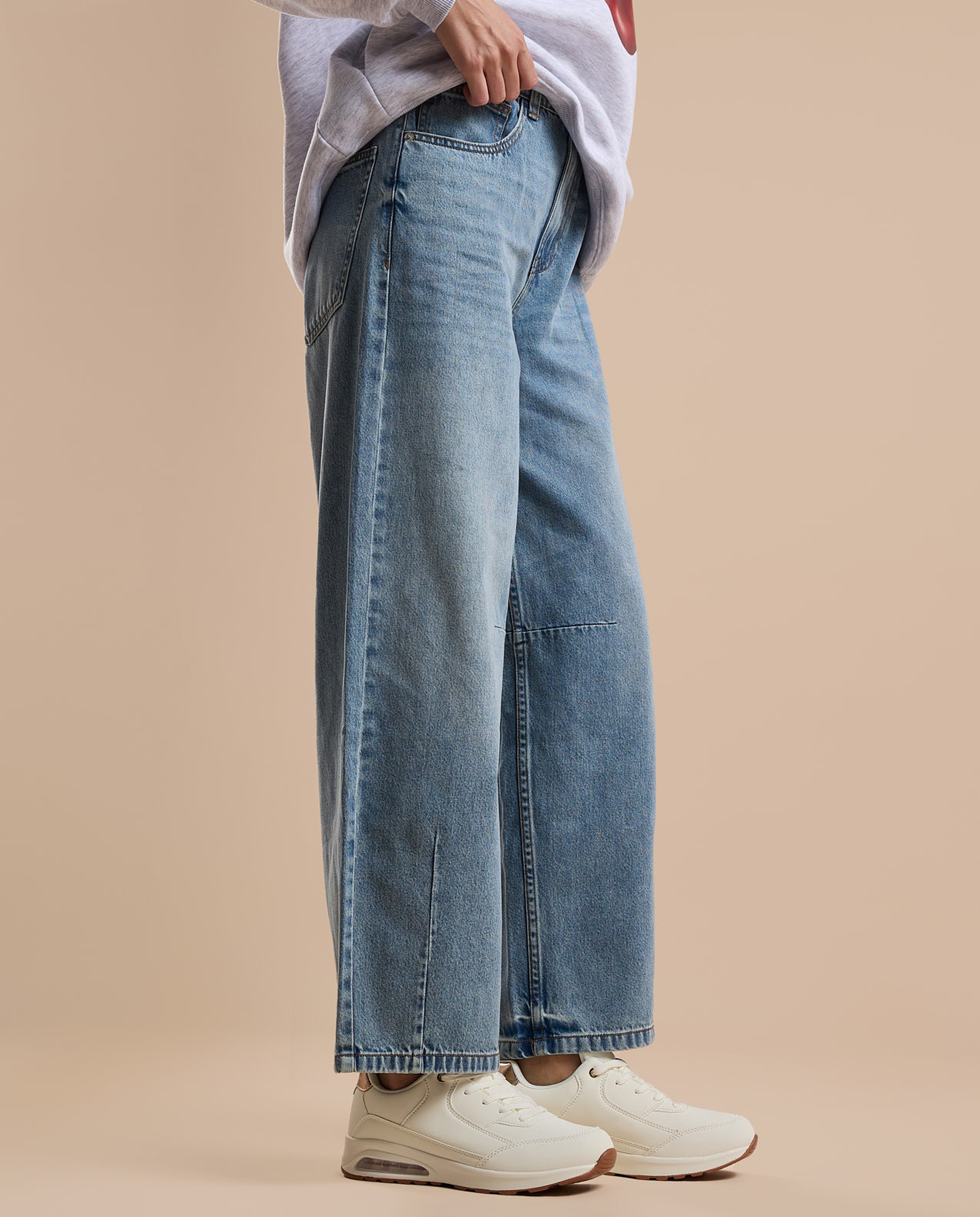 Faded Baggy Jeans with Button Closure