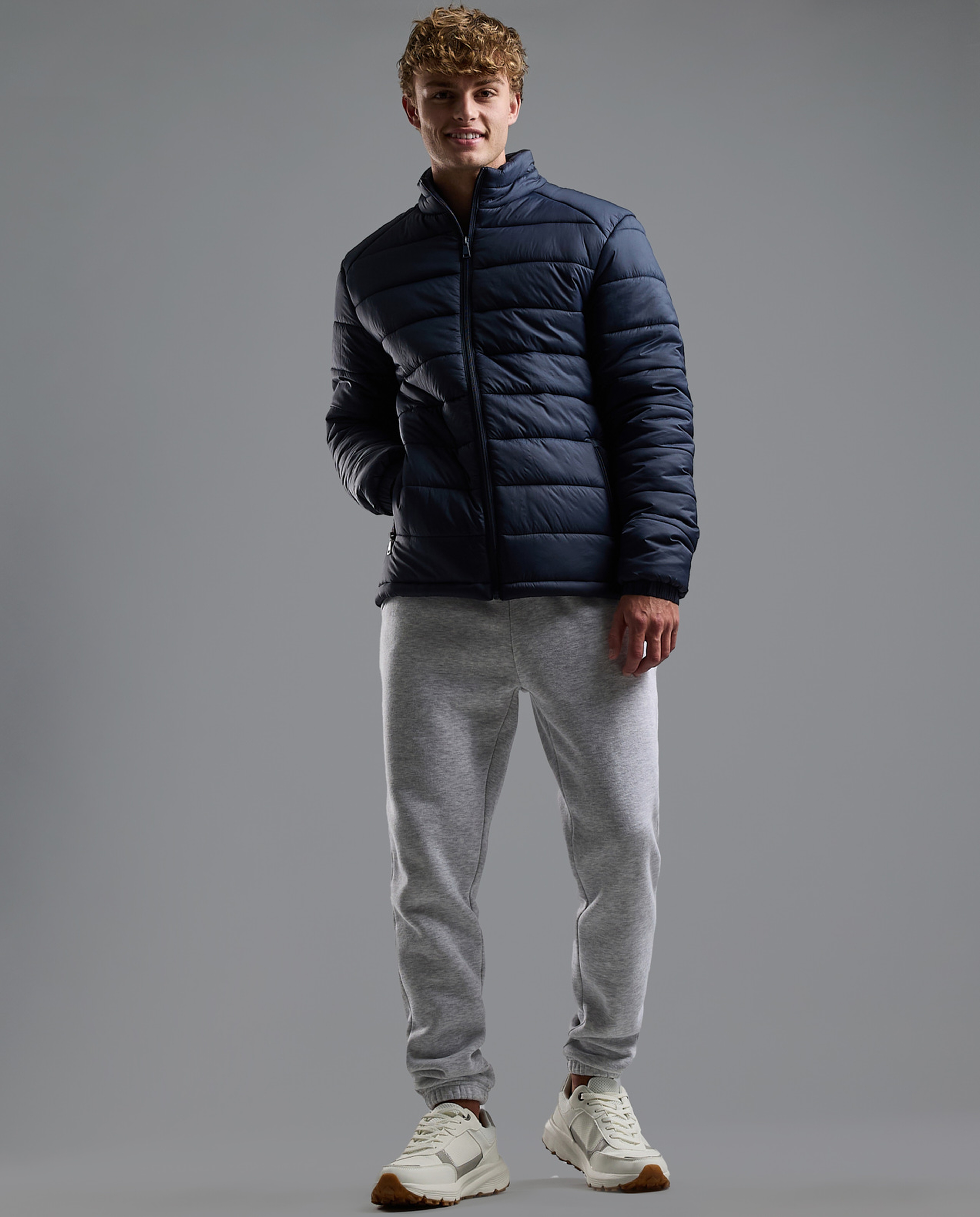 Quilted Puffer Jacket with Zipper Closure