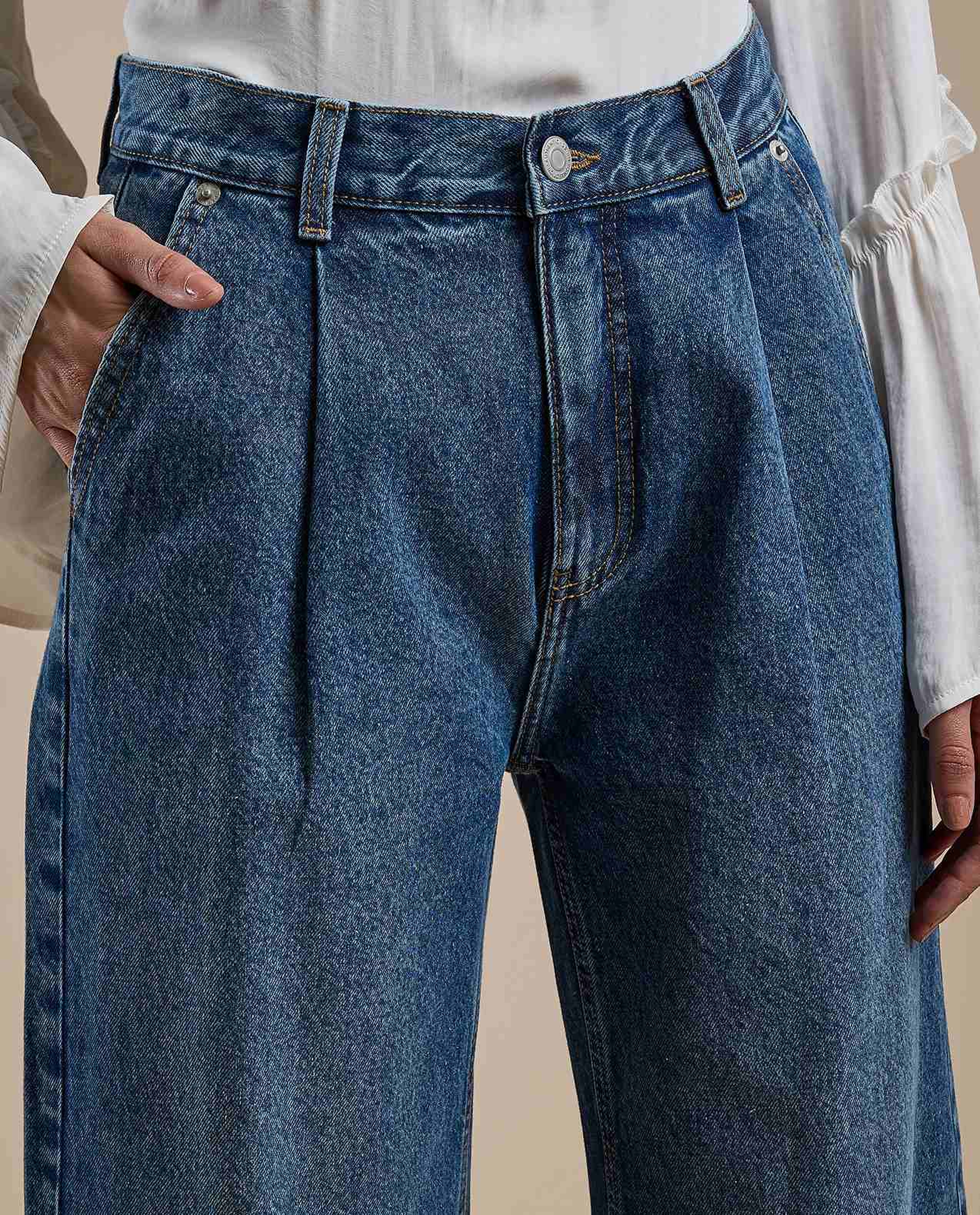 Washed Pleated Jeans with Button Closure