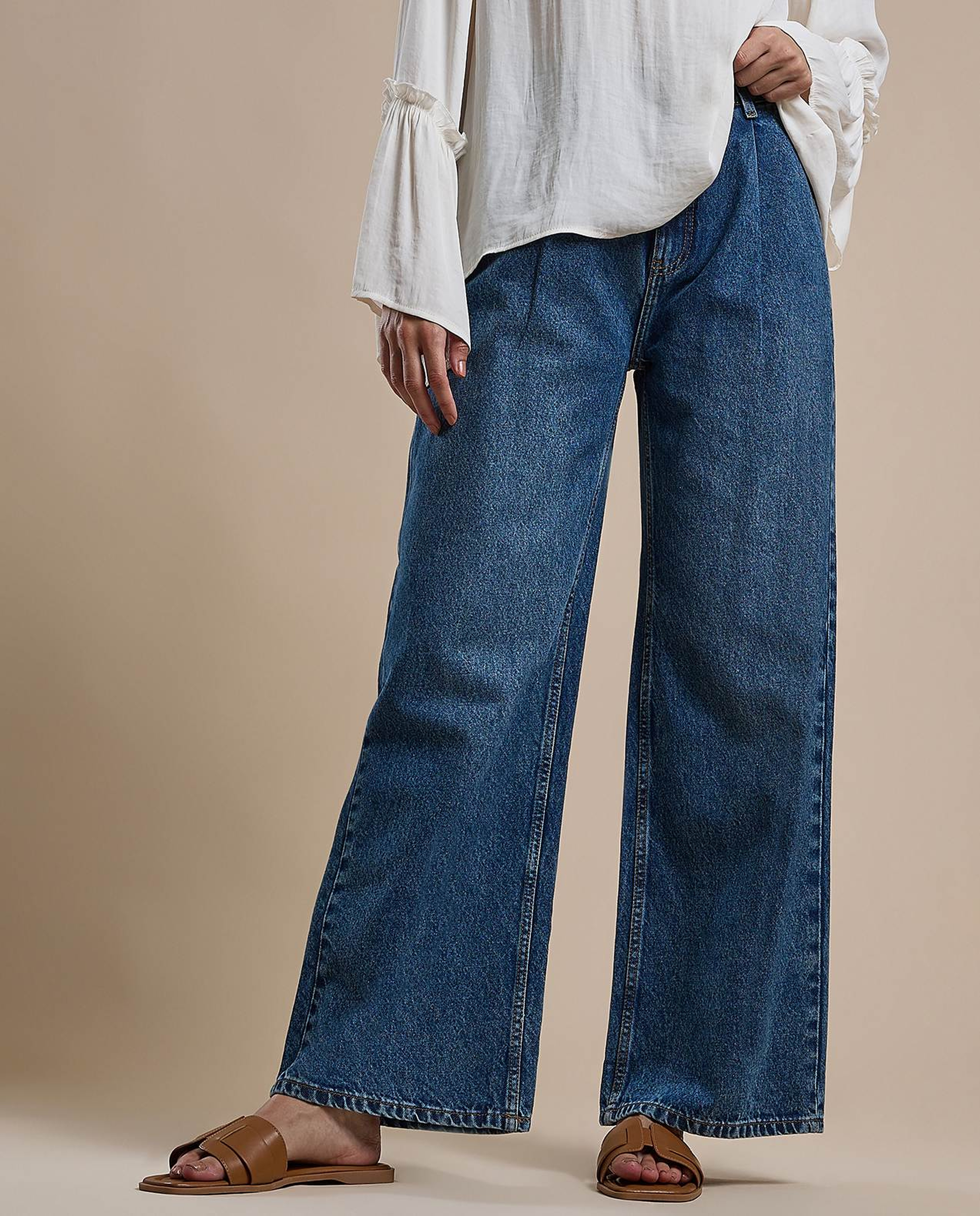 Washed Pleated Jeans with Button Closure