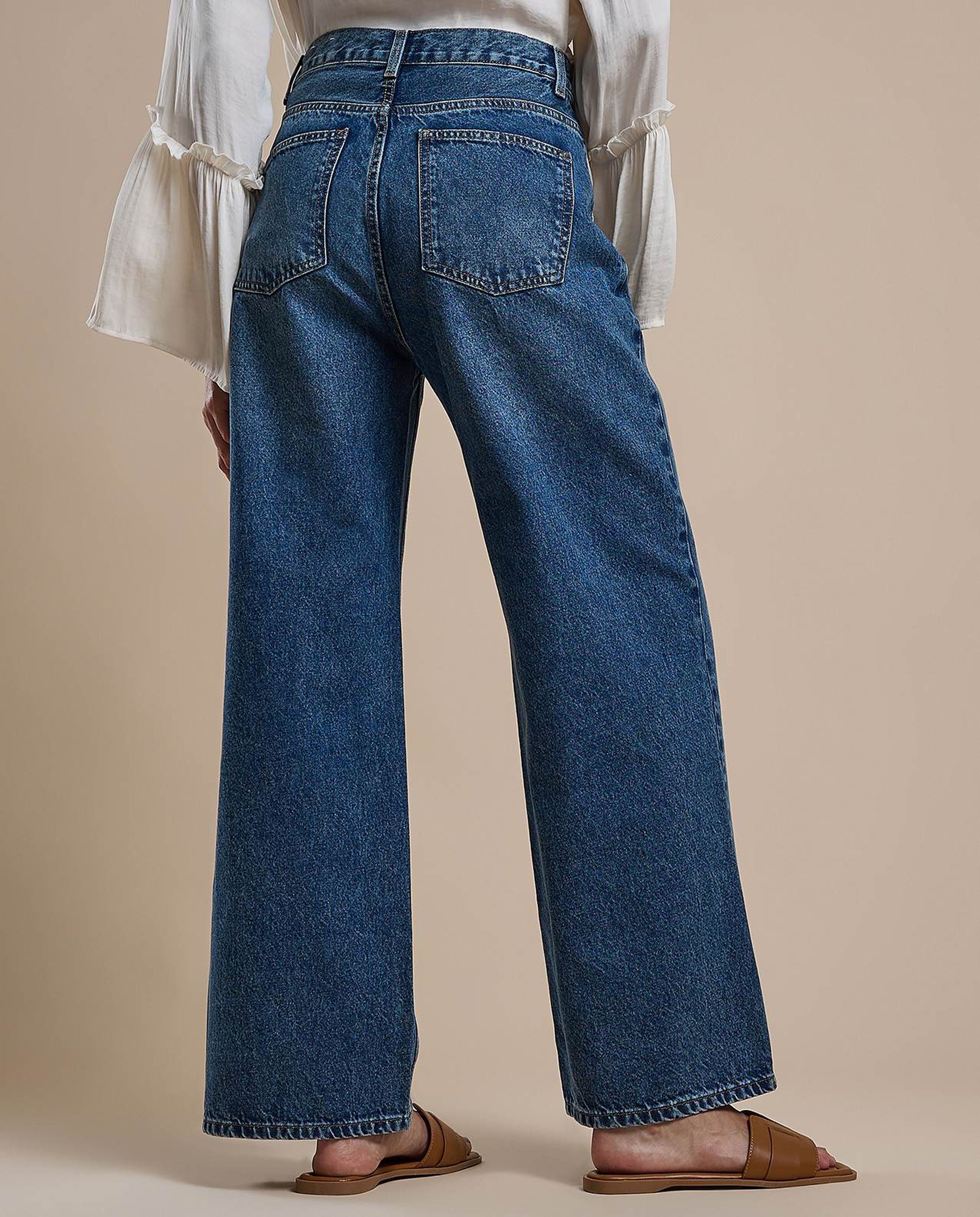 Washed Pleated Jeans with Button Closure
