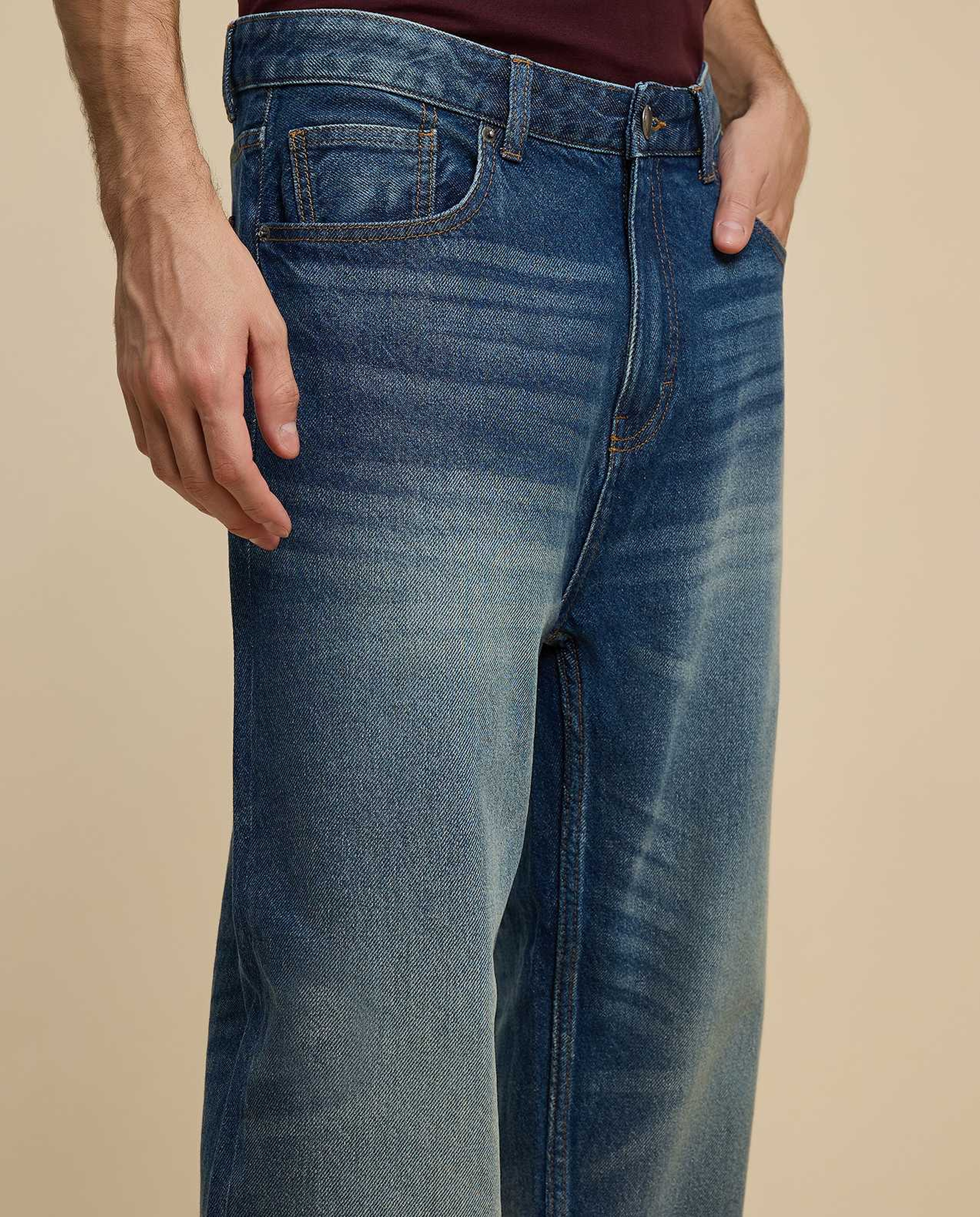 Faded Relaxed Fit Jeans with Button Closure