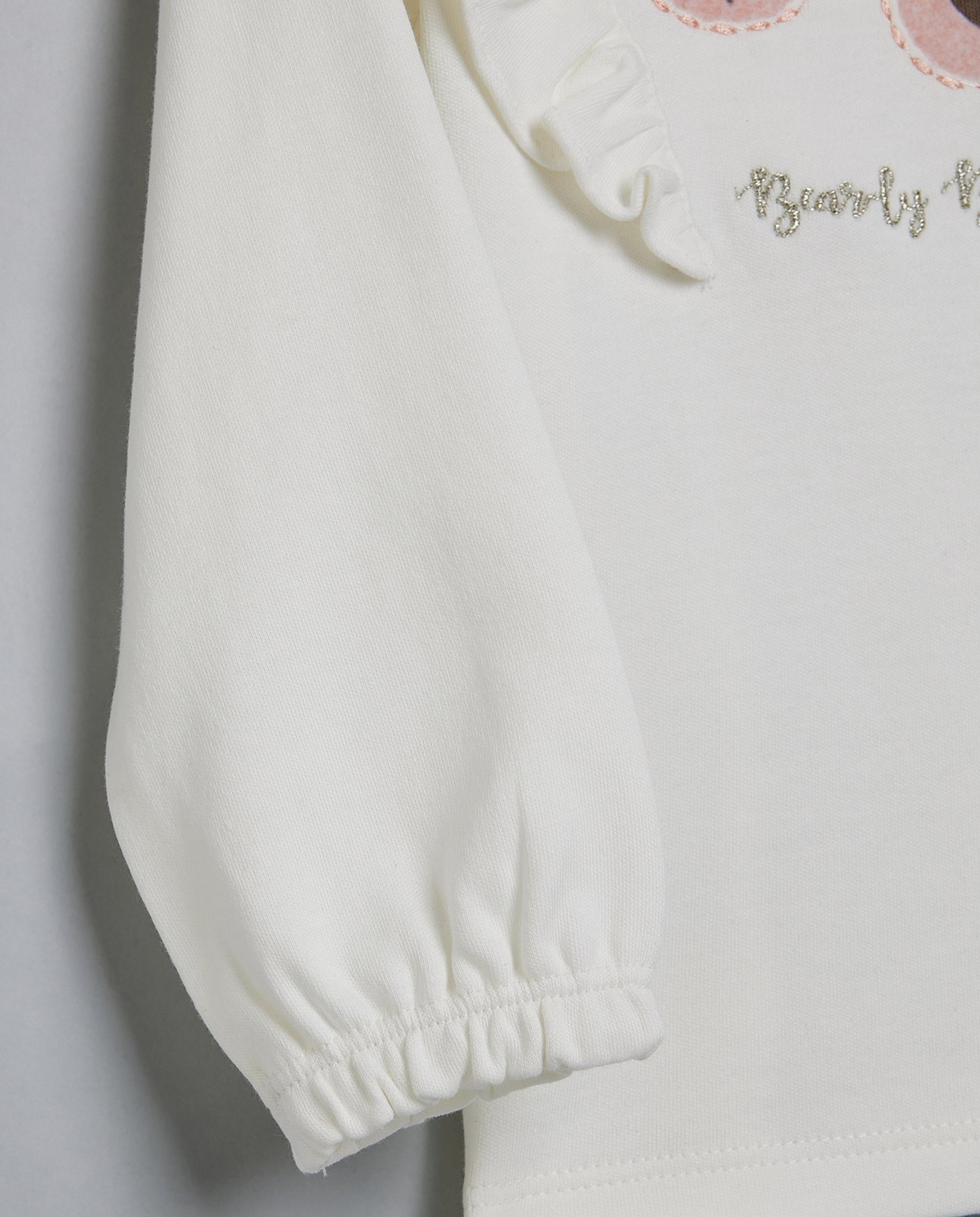 Appliqued Top with Crew Neck and Puff Sleeves