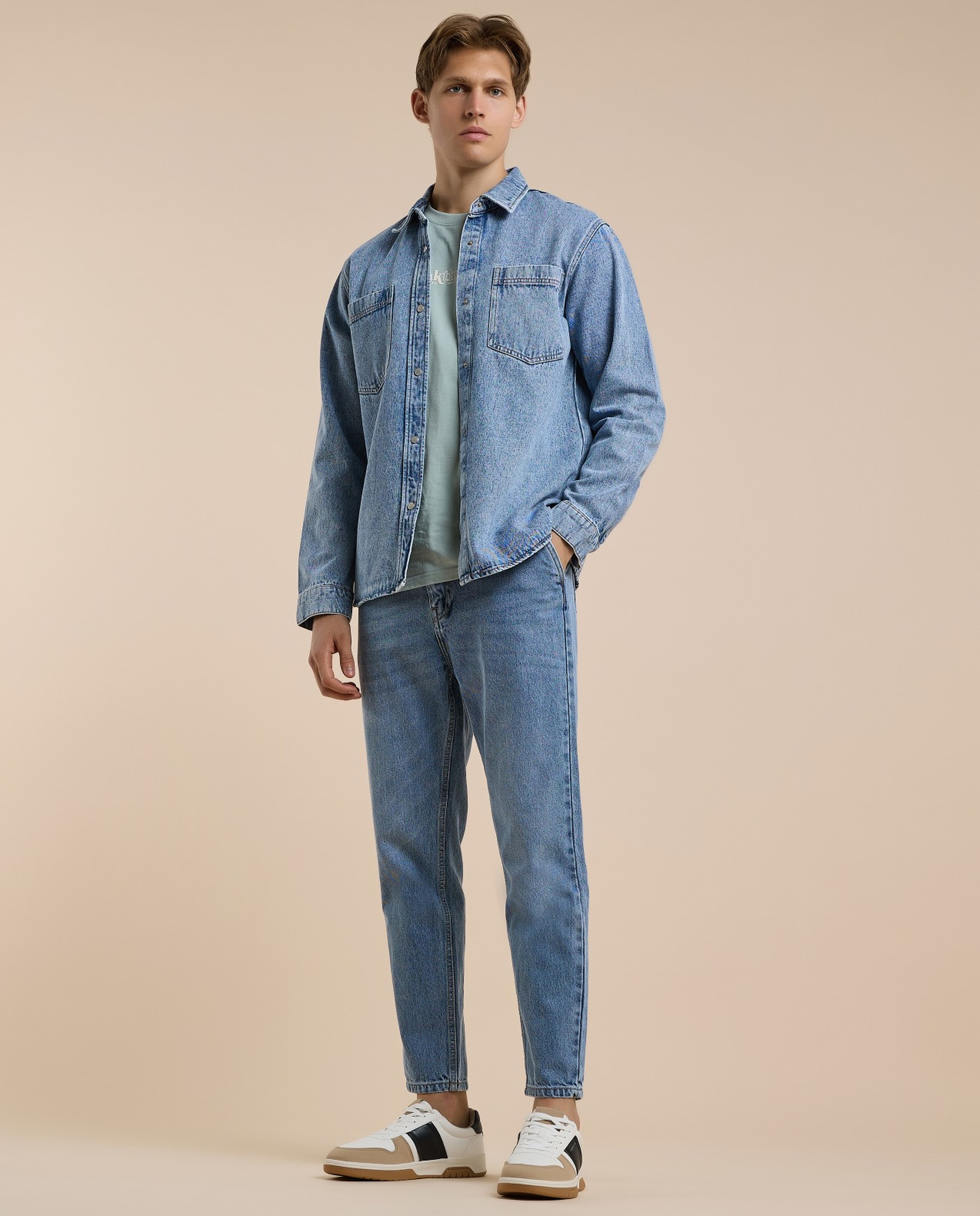 Washed Tapered Fit Jeans with Button Closure