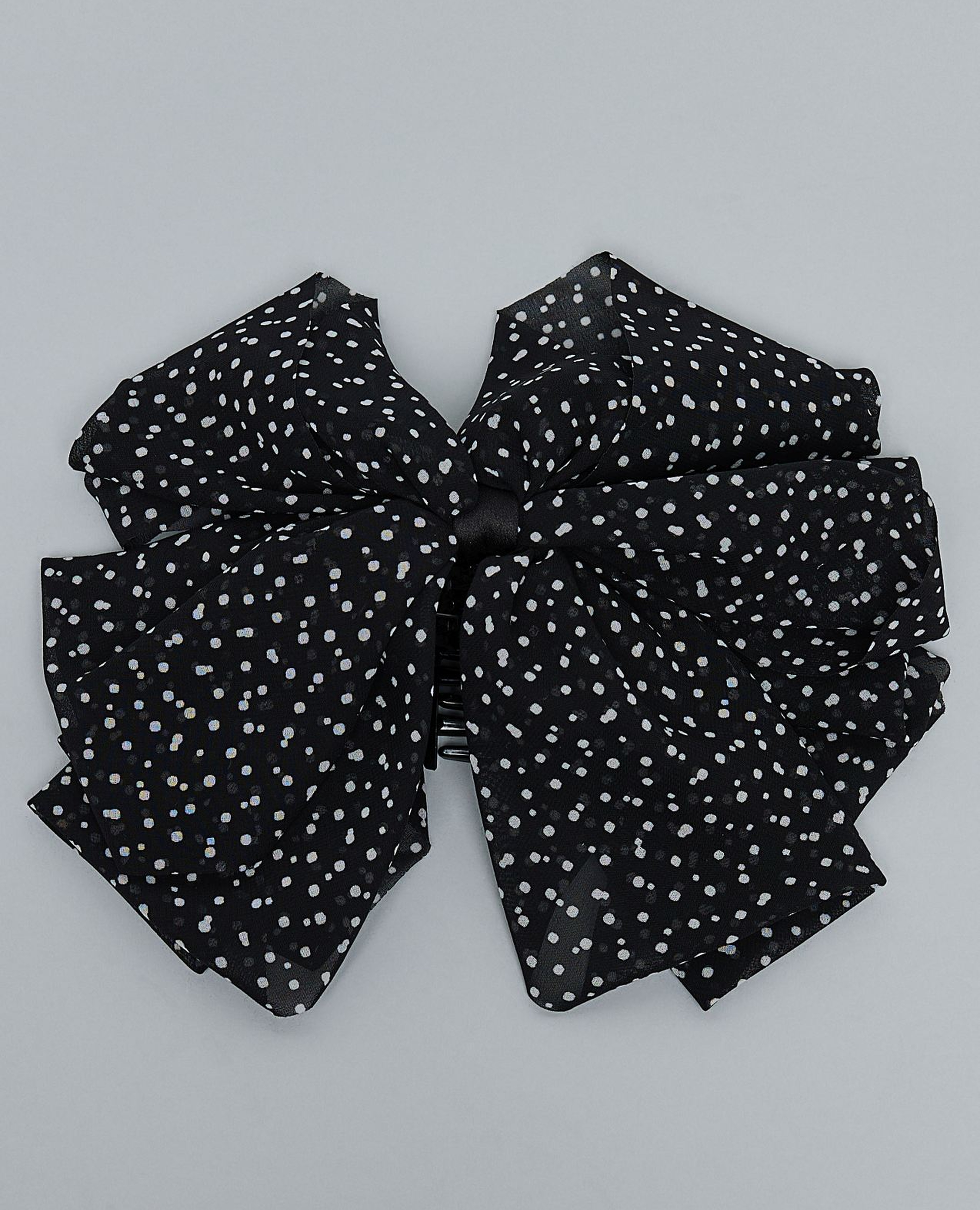 مشبك شعر بطبعة