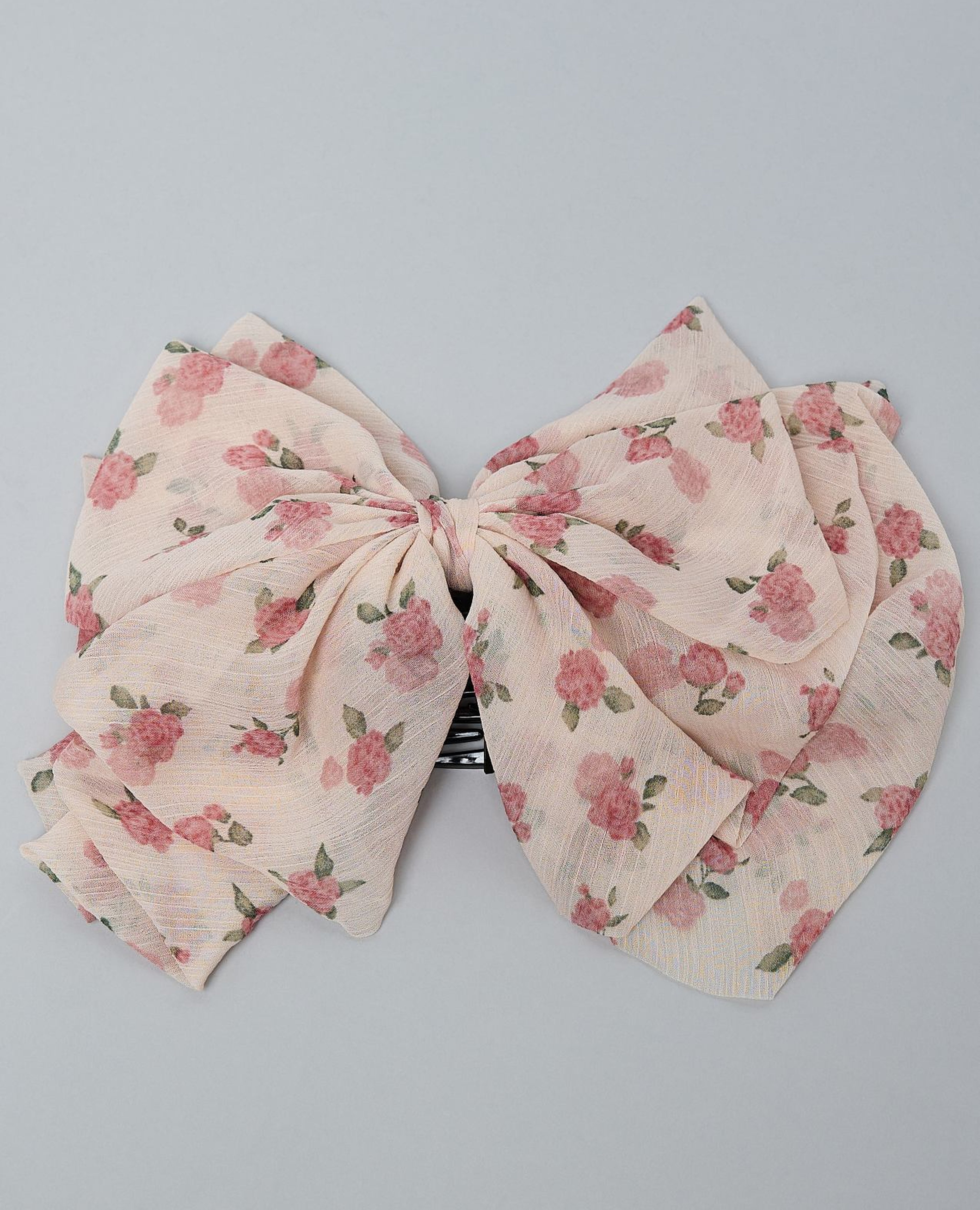 مشبك شعر بطبعة ورود