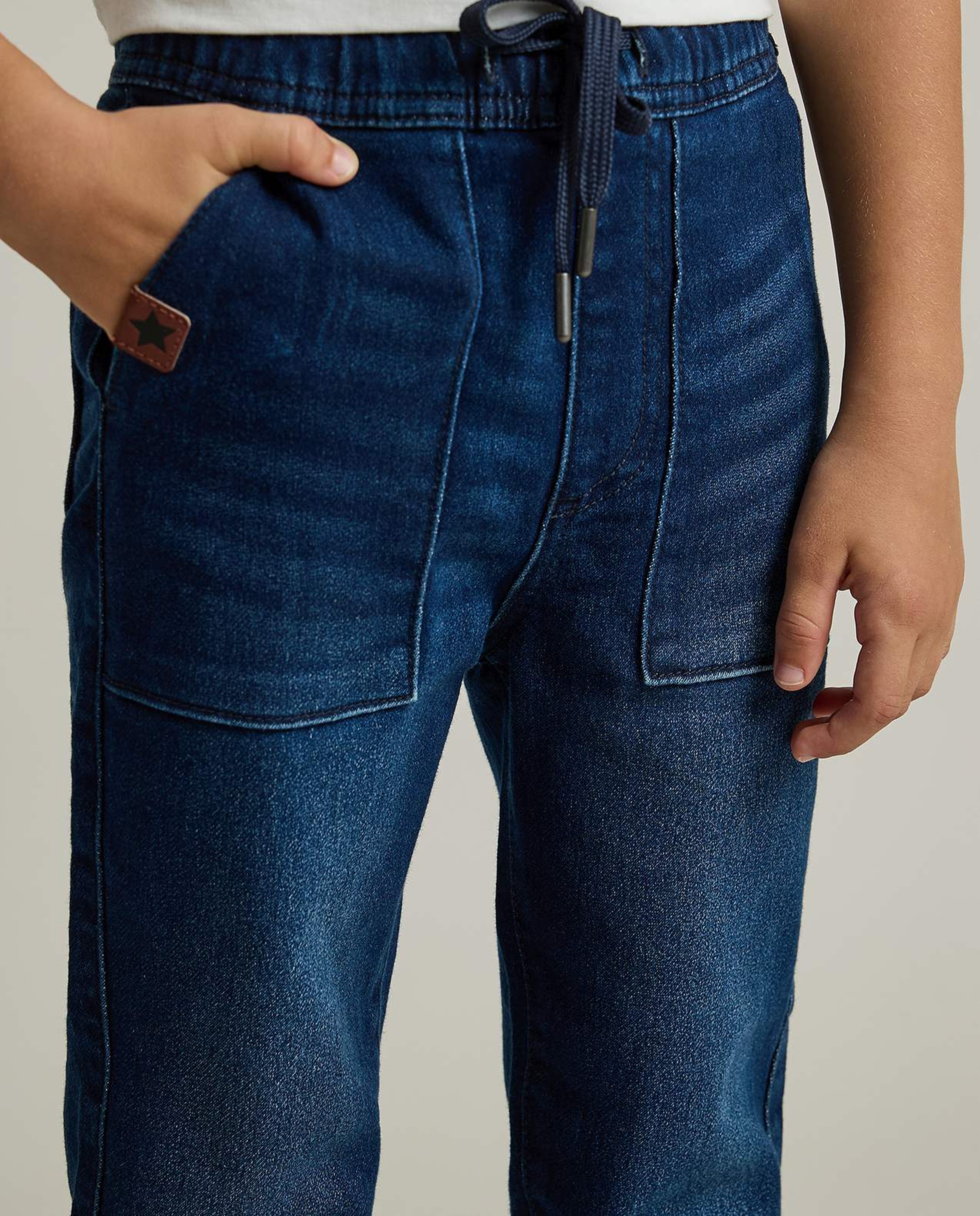 Faded Slim Fit Jeans with Button Closure