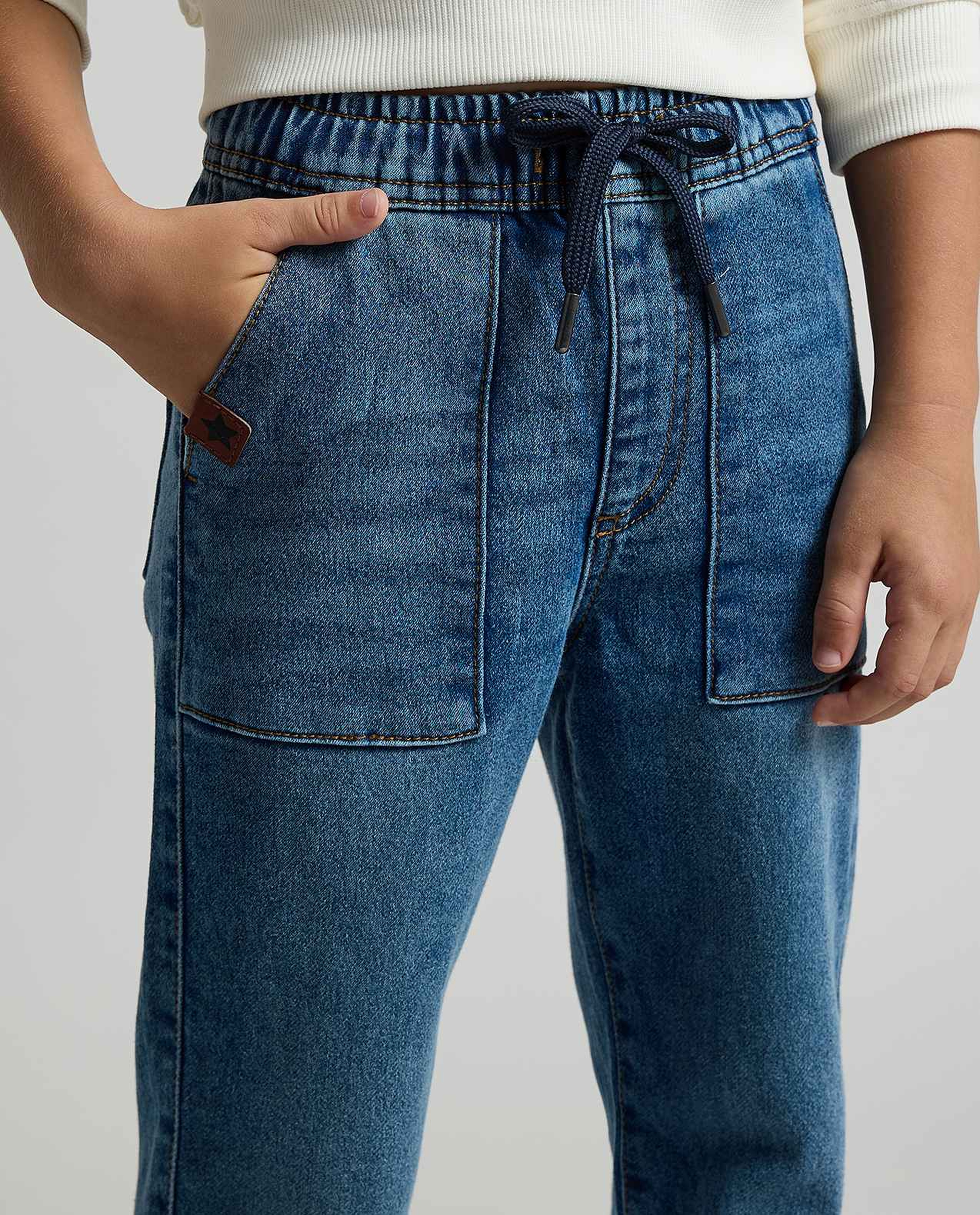 Faded Slim Fit Jeans with Button Closure