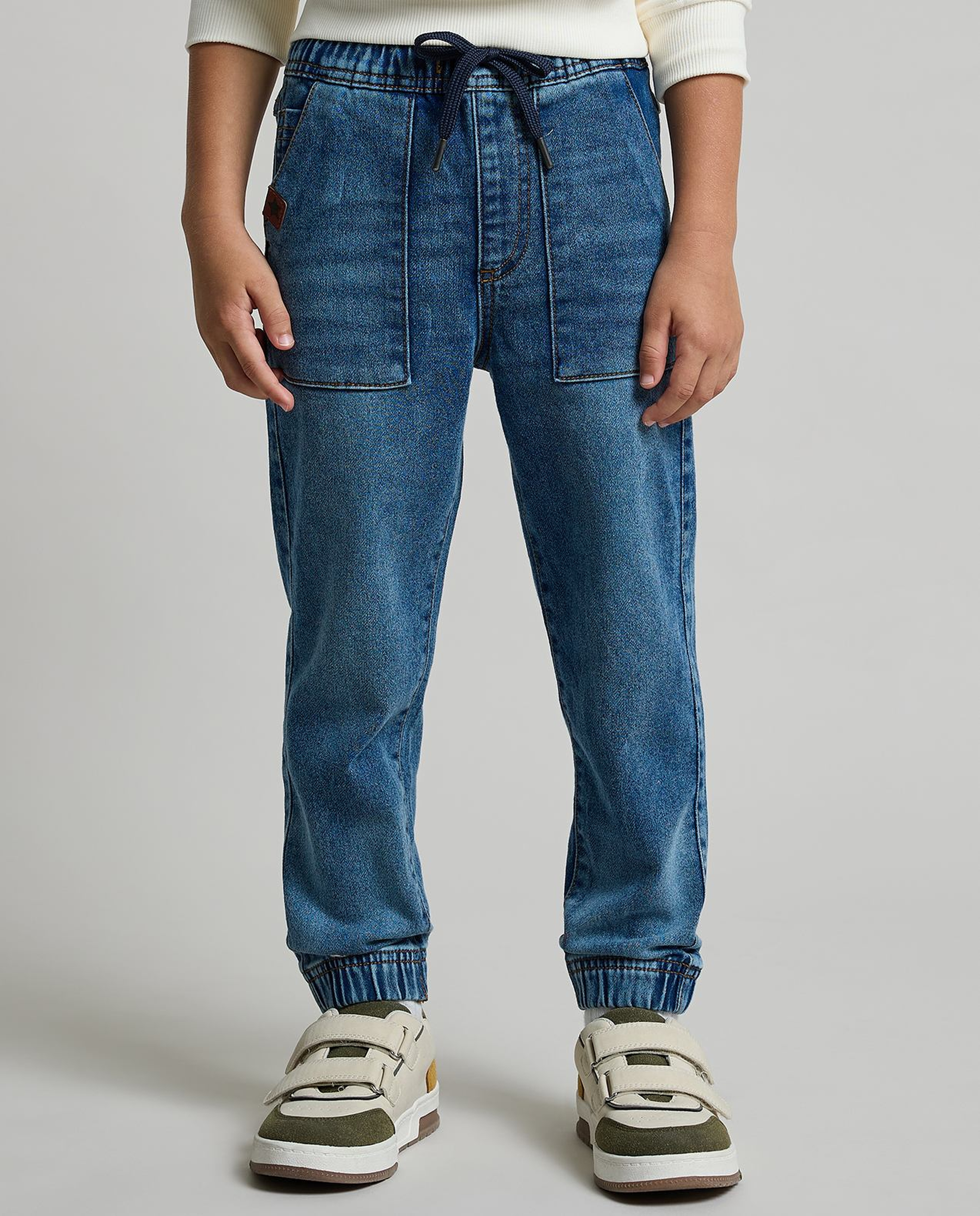 Faded Slim Fit Jeans with Button Closure